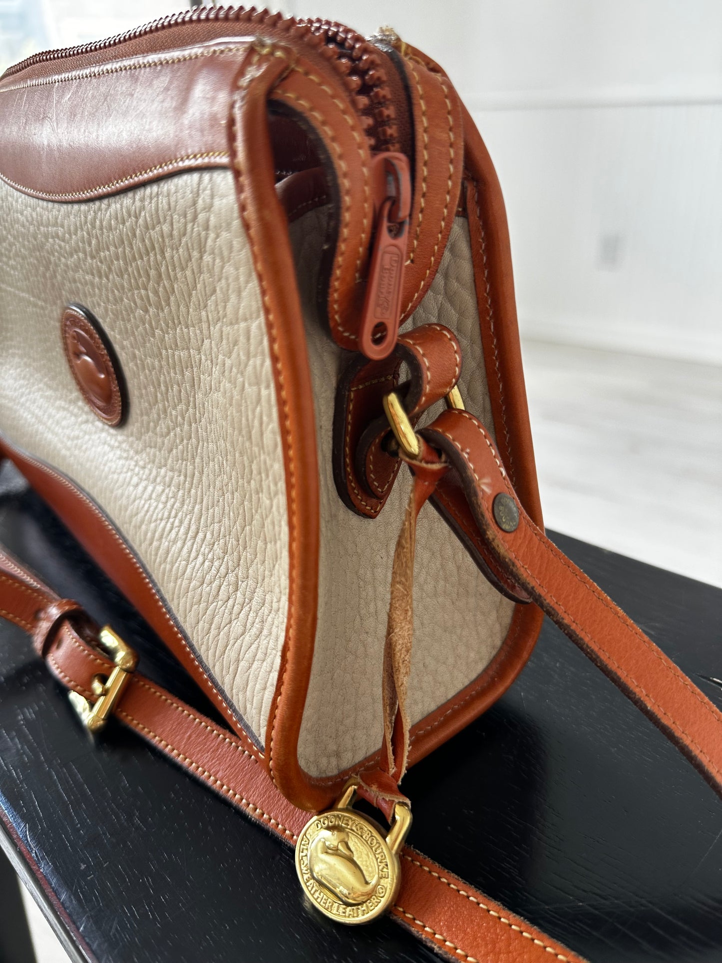90s Dooney and Bourke zip top crossbody in cream