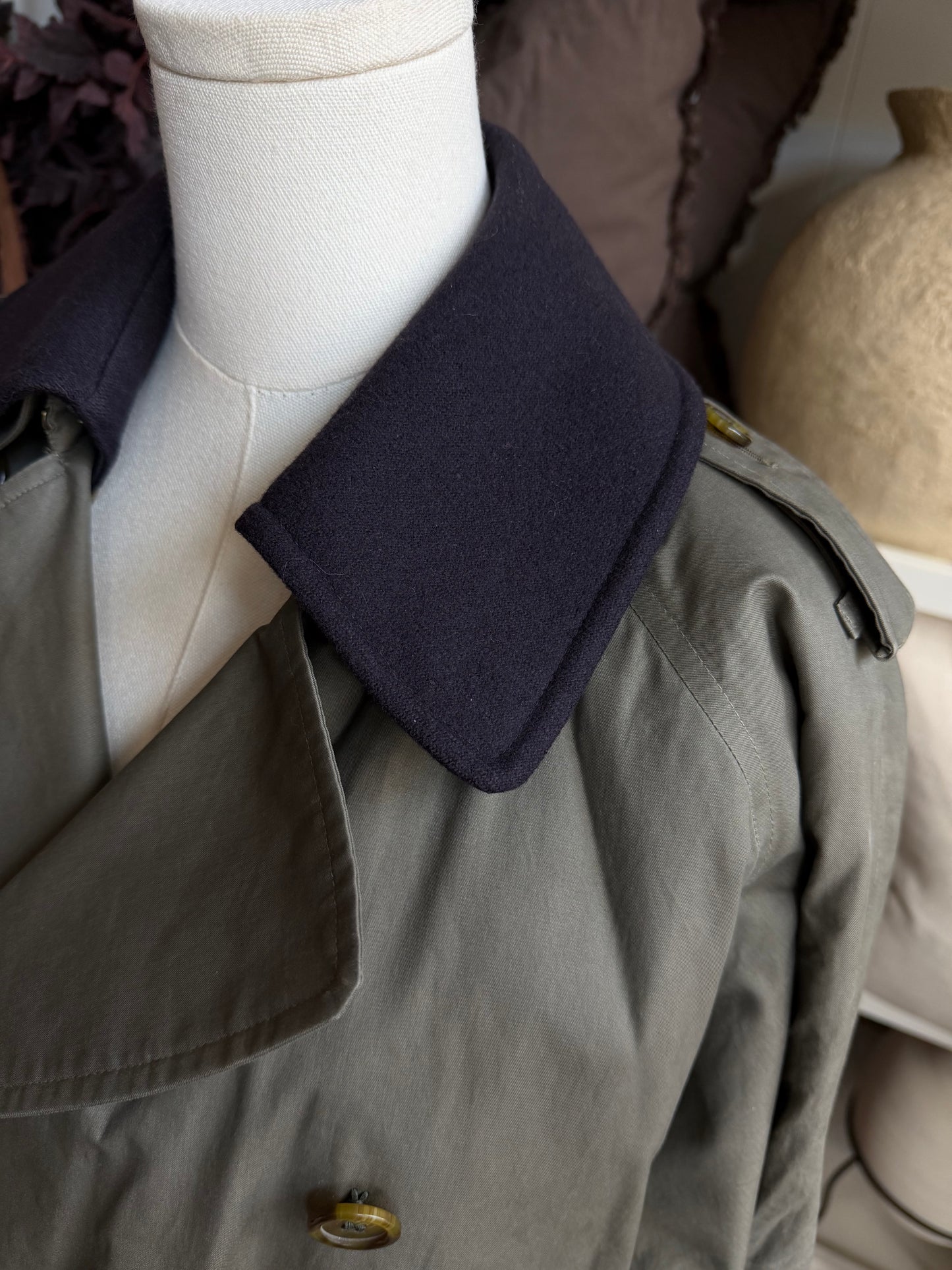 Vintage Burberry green trench with navy wool zip out lining and button off collar. Fits S-L