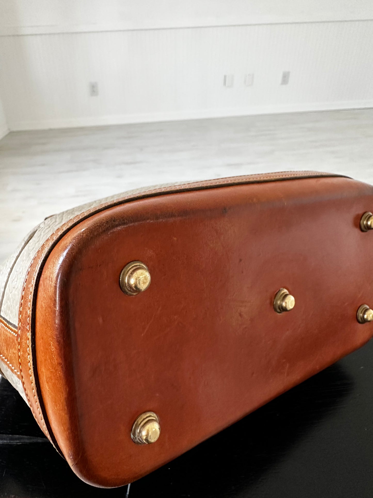 90s Dooney and Bourke Norfolk satchel in cream