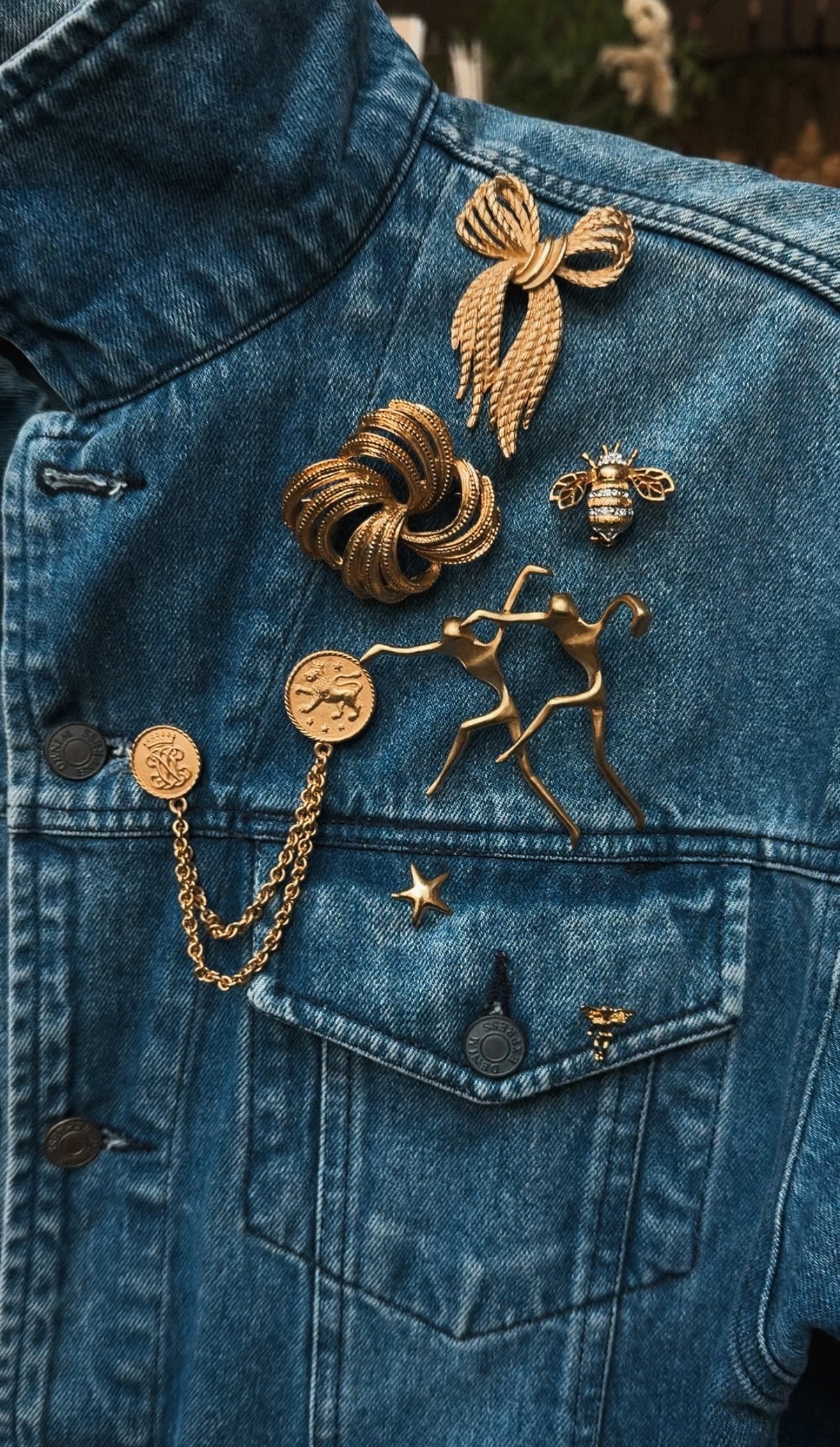 Vintage denim jacket with brooches