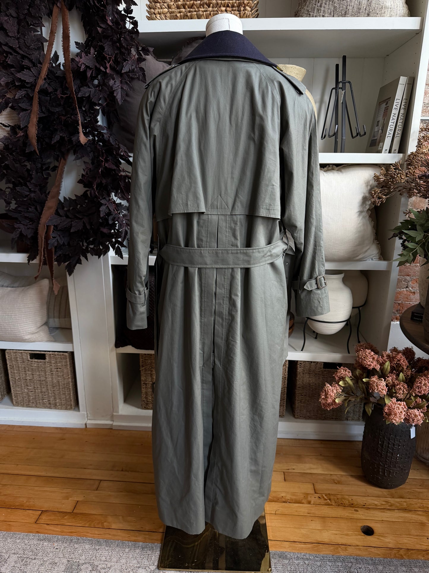 Vintage Burberry green trench with navy wool zip out lining and button off collar. Fits S-L