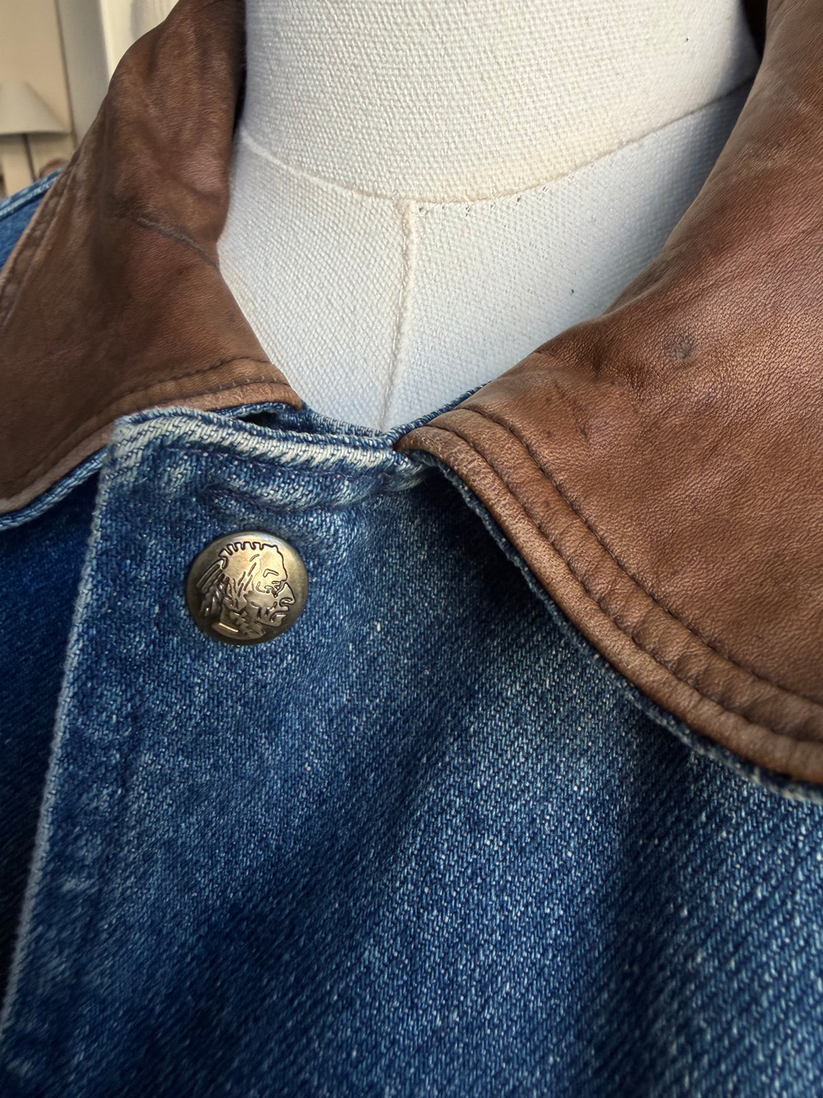 90s Woolrich denim barn coat with button out wool lining and leather collar. Made in the USA
