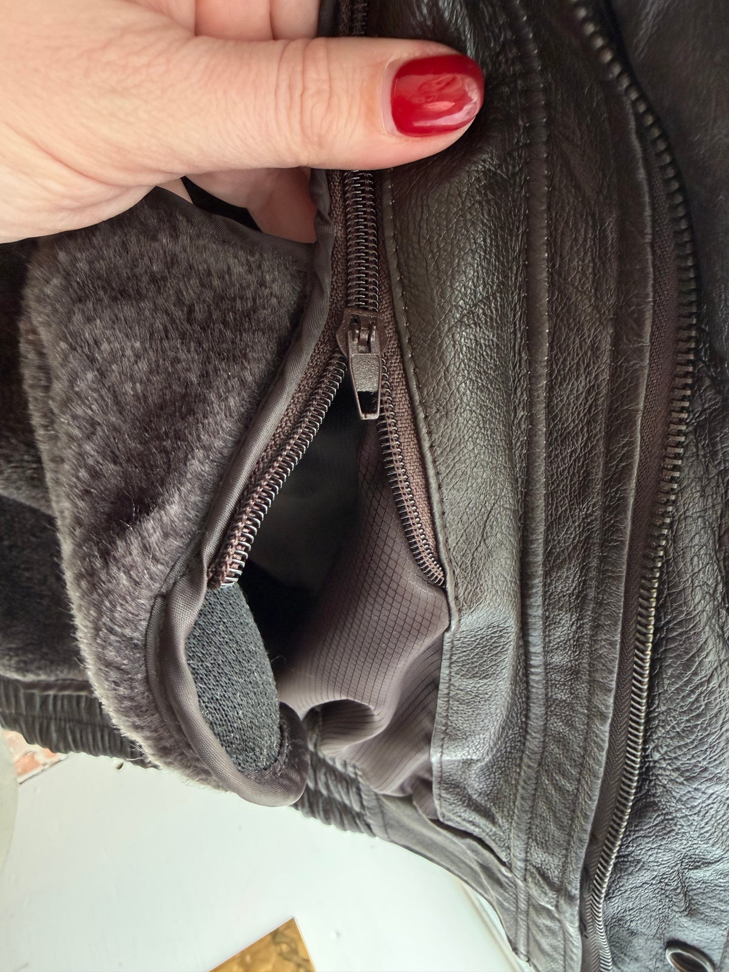 90s Phase Two leather bomber with zip out faux fur lining.