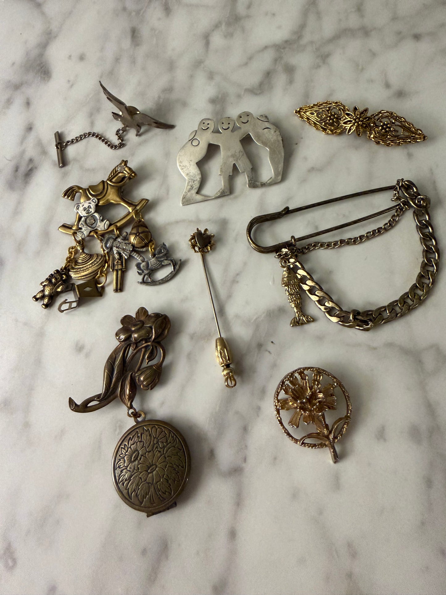 Brass and silver brooch pack