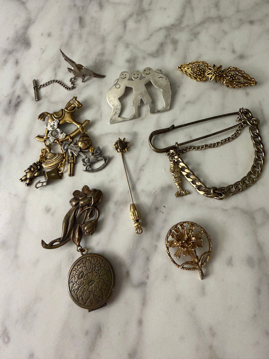 Brass and silver brooch pack
