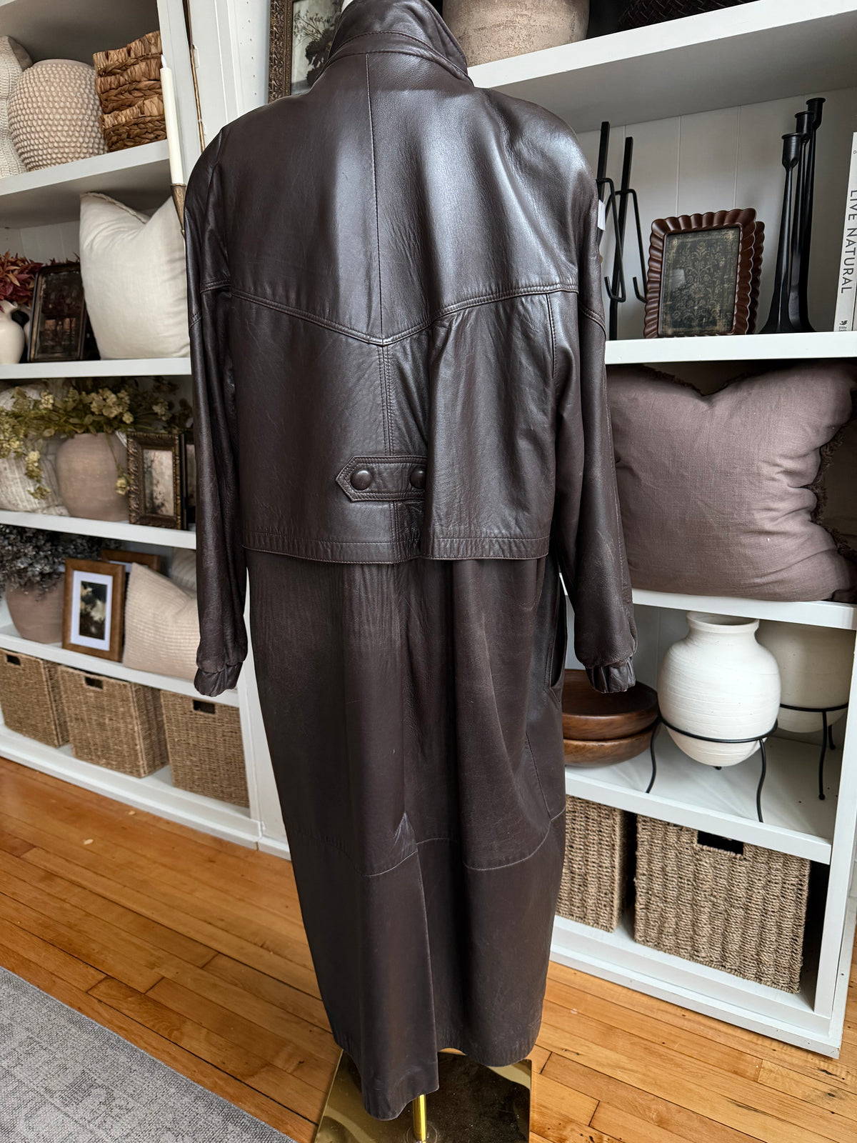 80s Tibor leather trench with zip out insulation and a zip off leather hood with real fur trim. Made in the USA. Fits S-L