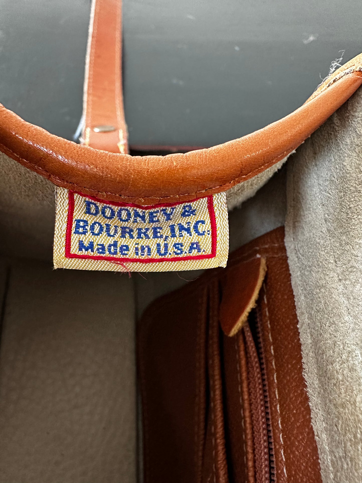90s Dooney and Bourke Essex in cream