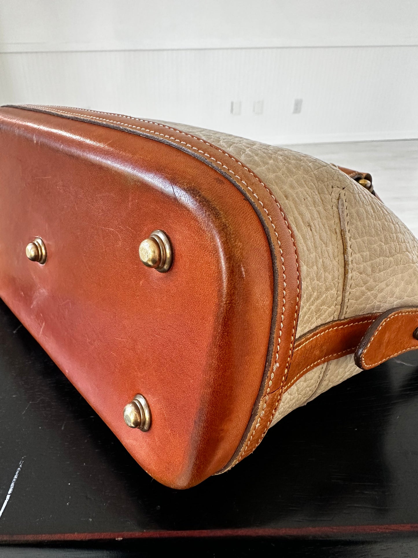 90s Dooney and Bourke Norfolk satchel in cream