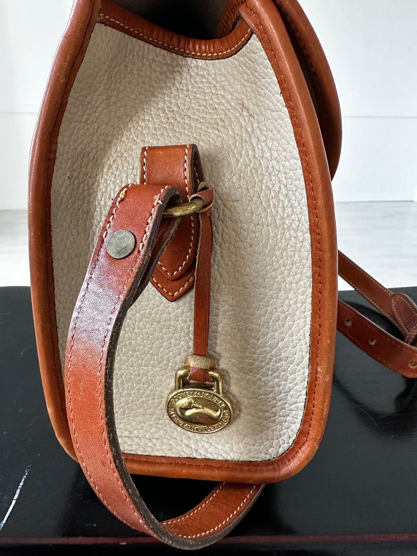 90s Dooney and Bourke Essex in cream