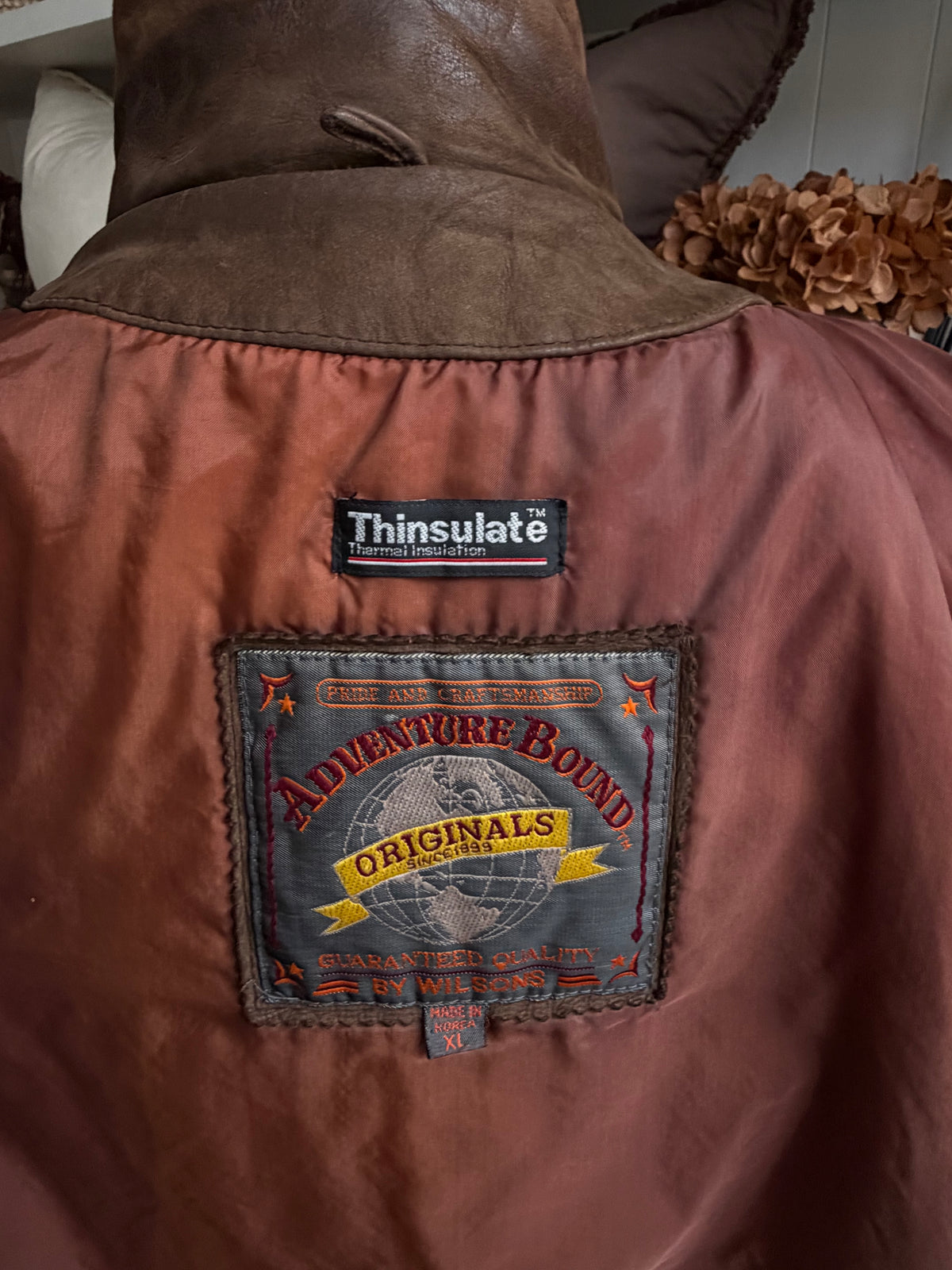90s Wilson’s Adventure Bound leather bomber. Fits S-L