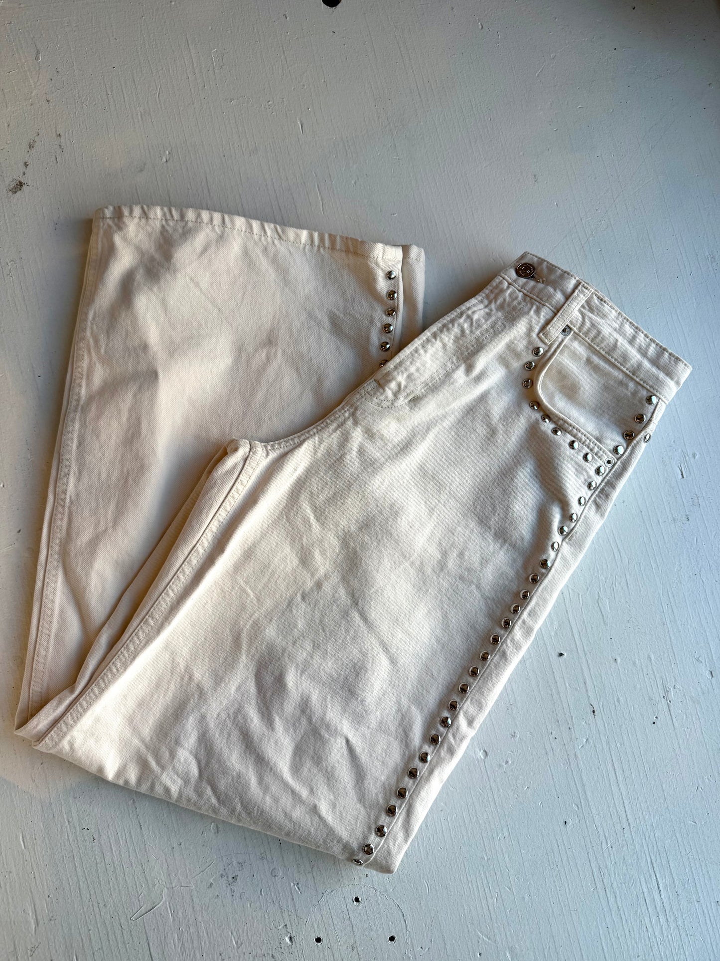 Reformation Carly studded jeans in cream. Size 28
