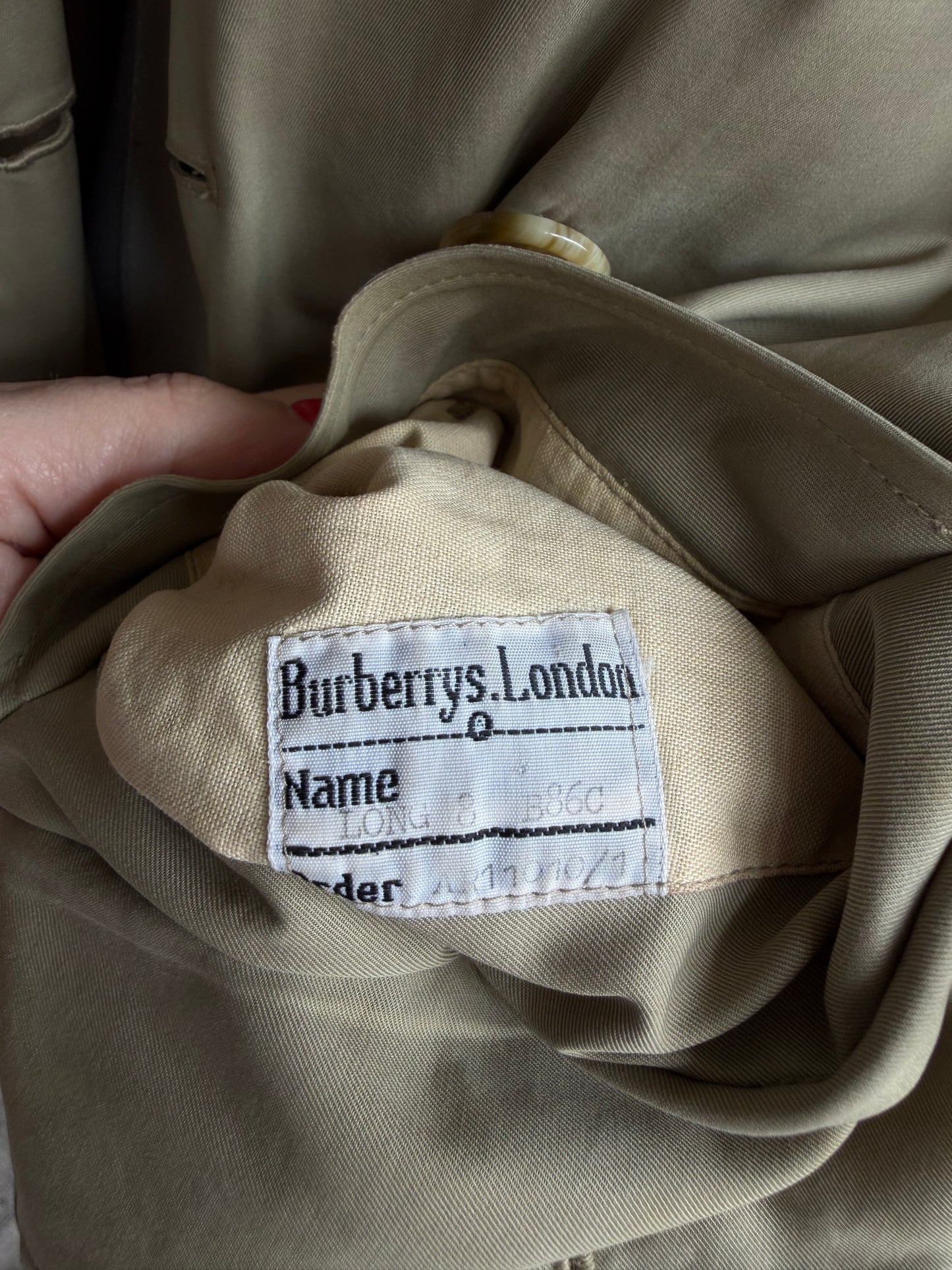 Vintage Burberry green khaki trench with removable wool lining. Made in the USA.