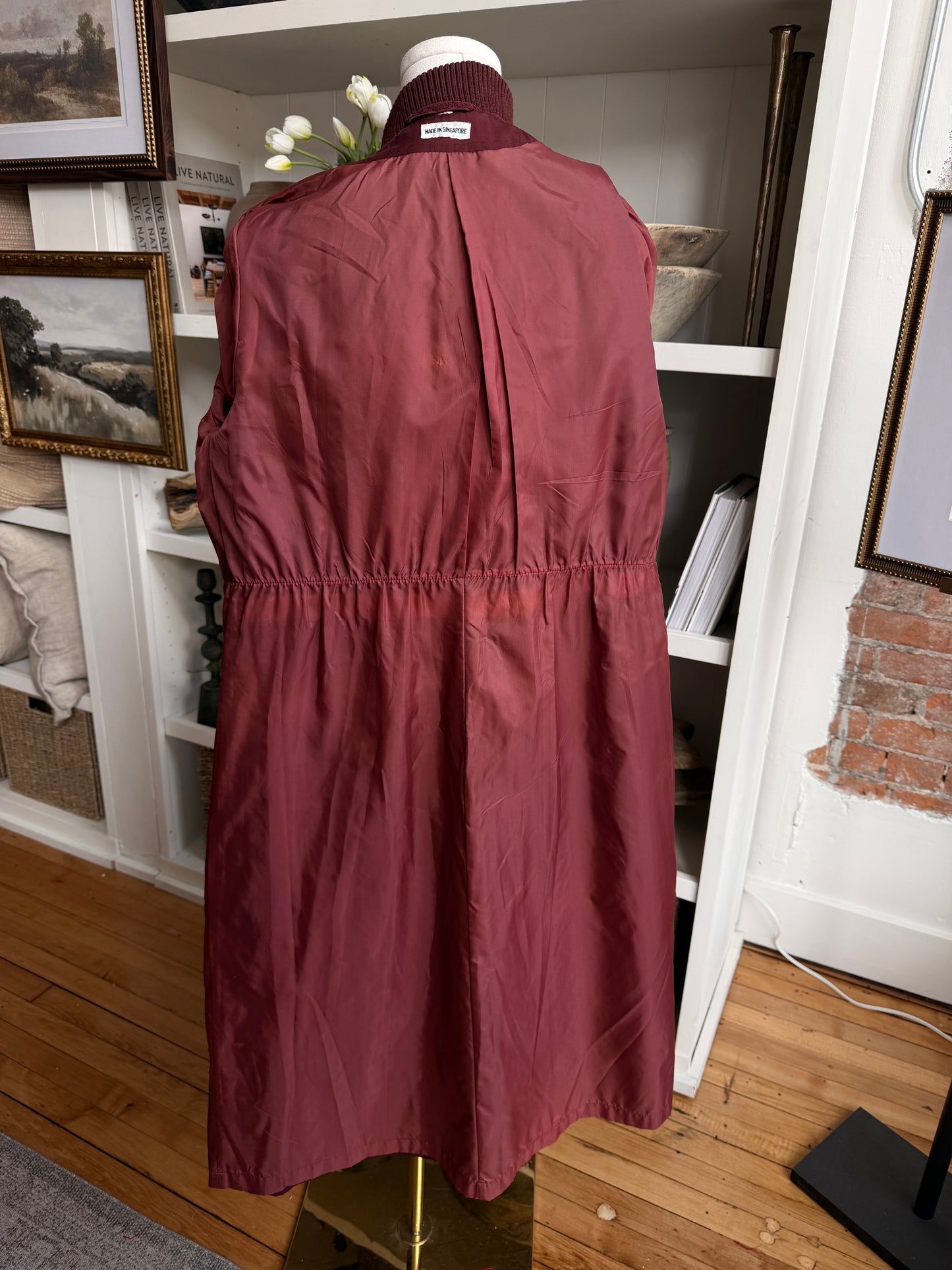 Vintage maroon trench with bomber details. Made in Singapore