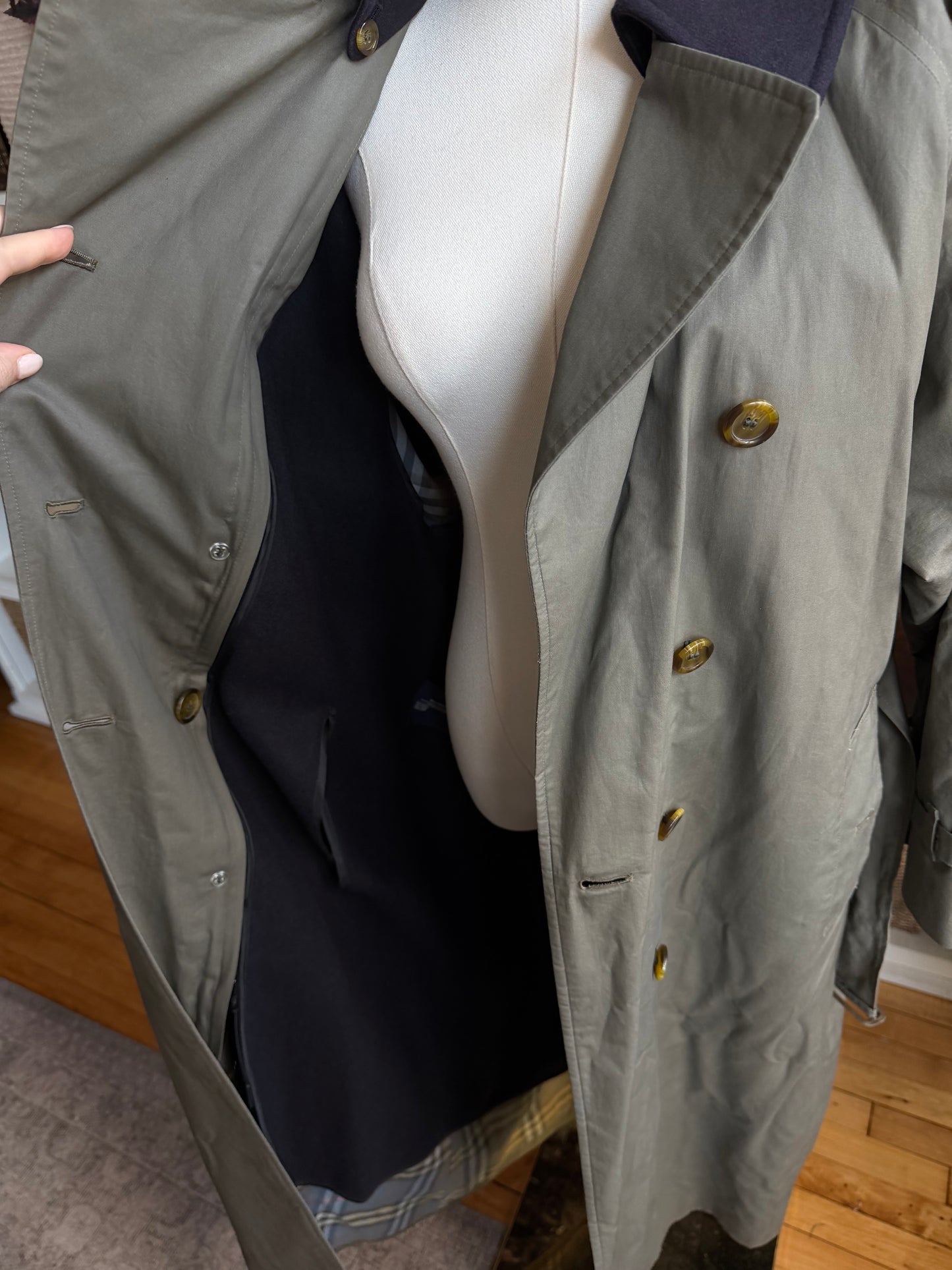 Vintage Burberry green trench with navy wool zip out lining and button off collar. Fits S-L