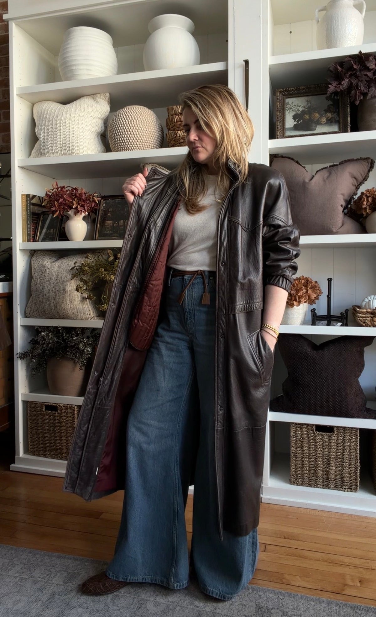 80s Tibor leather trench with zip out insulation and a zip off leather hood with real fur trim. Made in the USA. Fits S-L