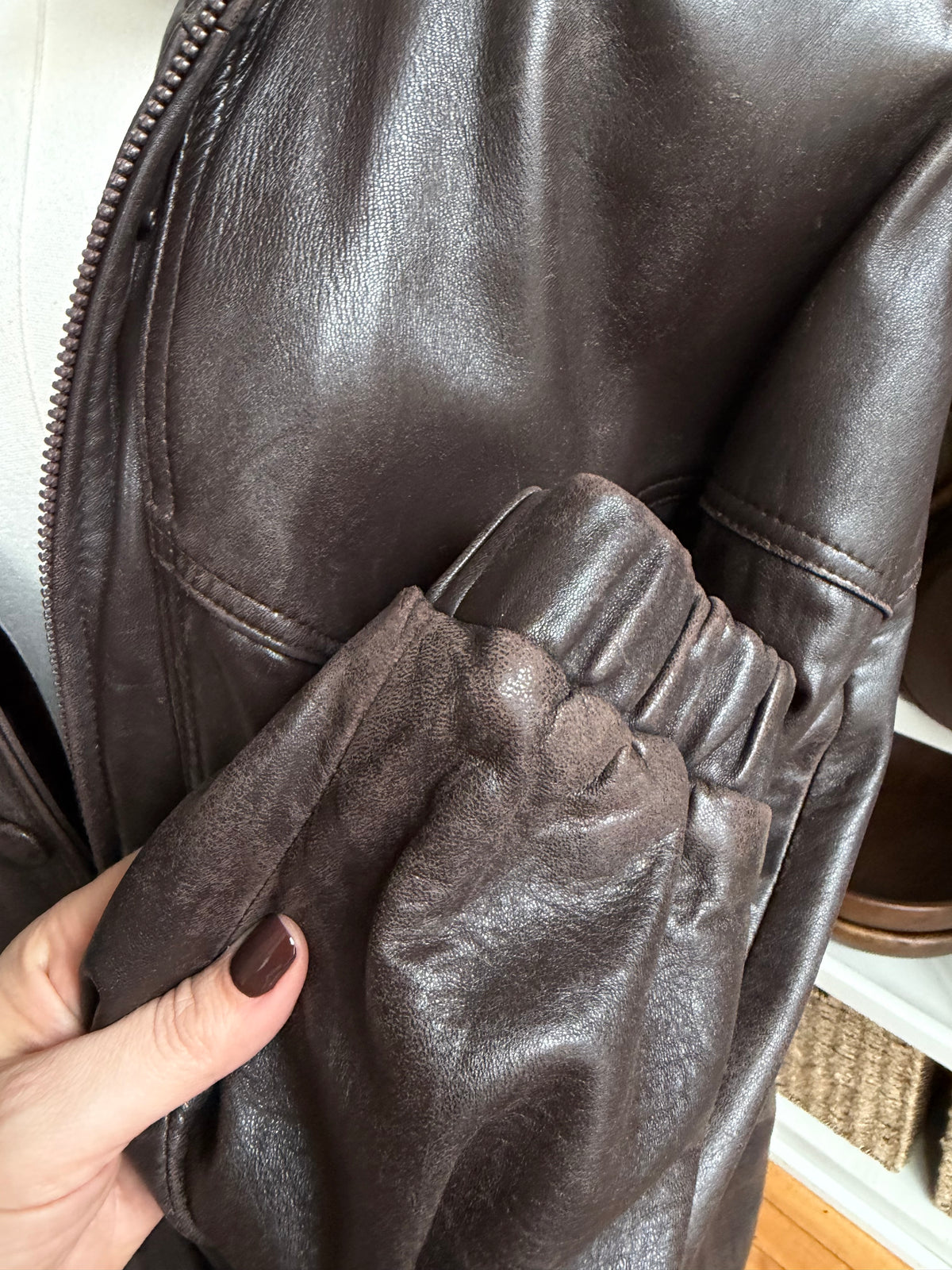 80s Tibor leather trench with zip out insulation and a zip off leather hood with real fur trim. Made in the USA. Fits S-L