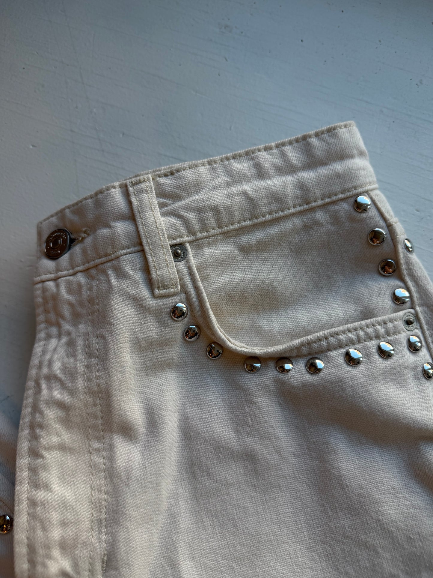 Reformation Carly studded jeans in cream. Size 28