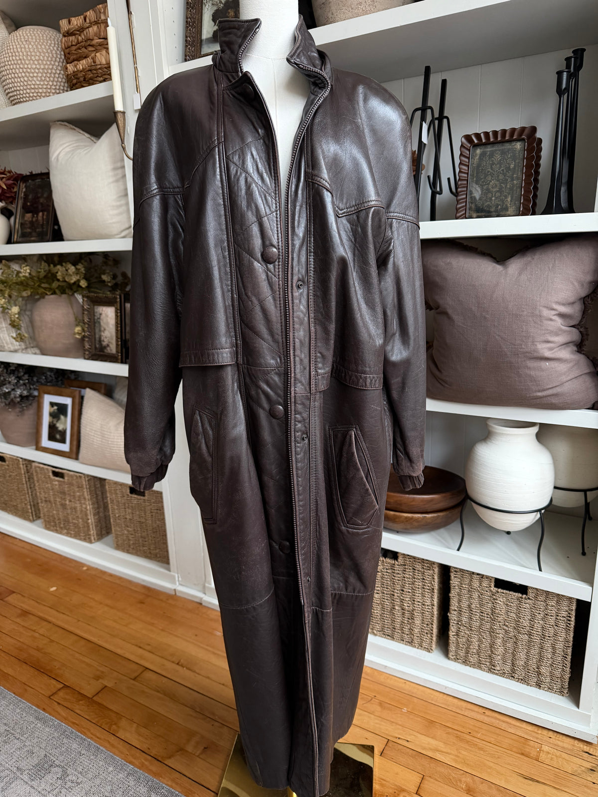 80s Tibor leather trench with zip out insulation and a zip off leather hood with real fur trim. Made in the USA. Fits S-L