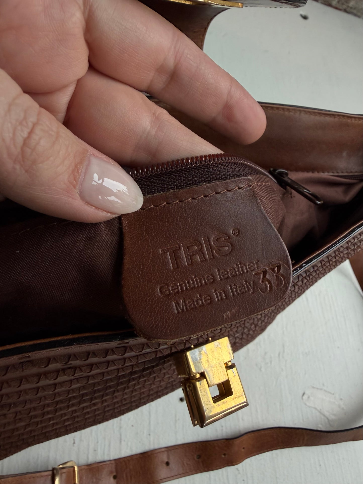 Tris leather shoulder bag. Made in Italy