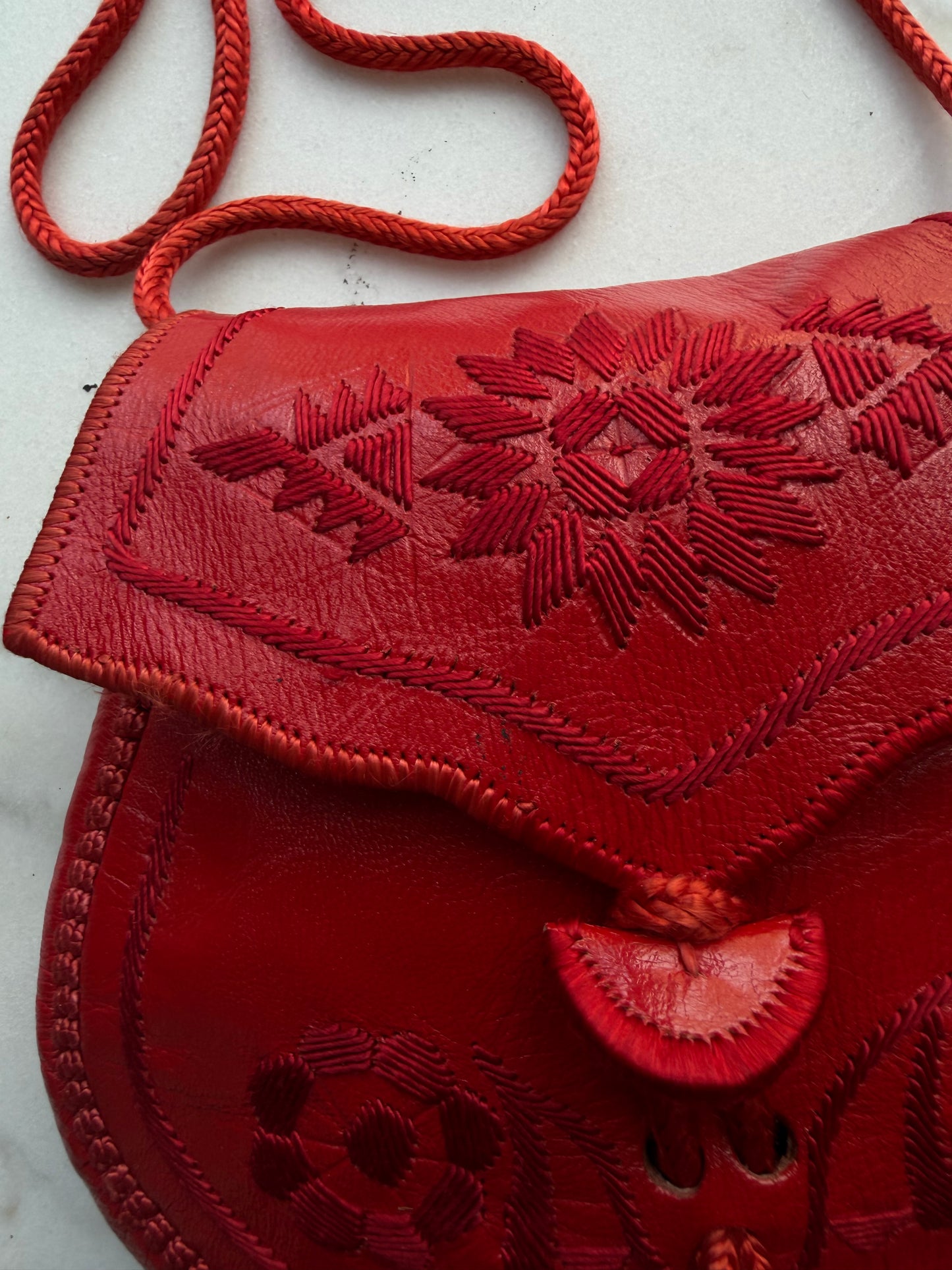 Vintage red leather embroidered crossbody. Sourced in Paris