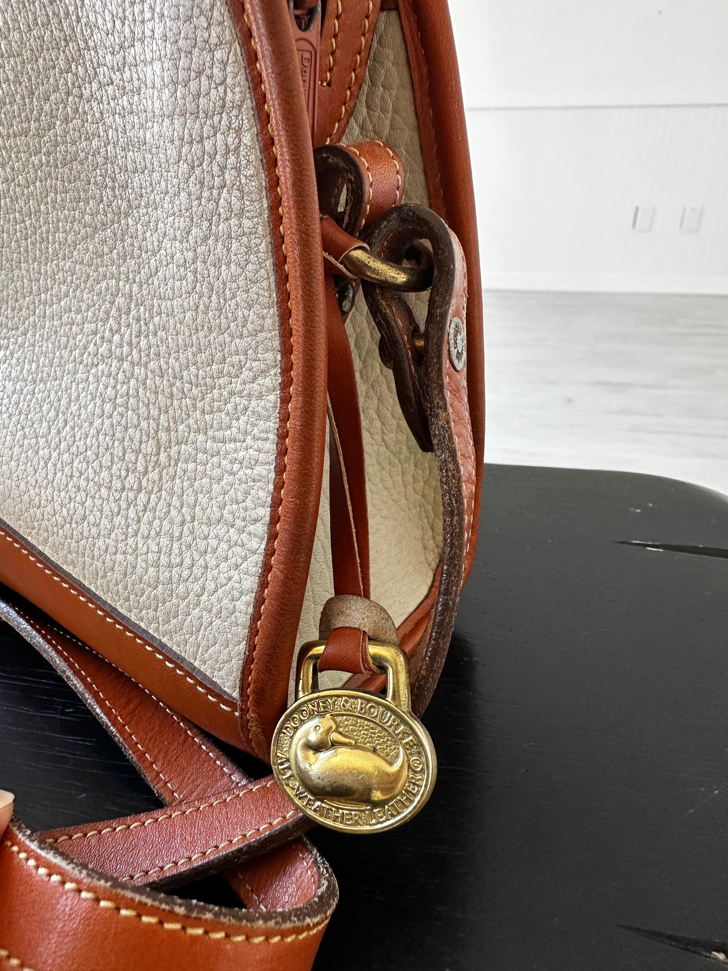 90s Dooney and Bourke zip top crossbody in cream