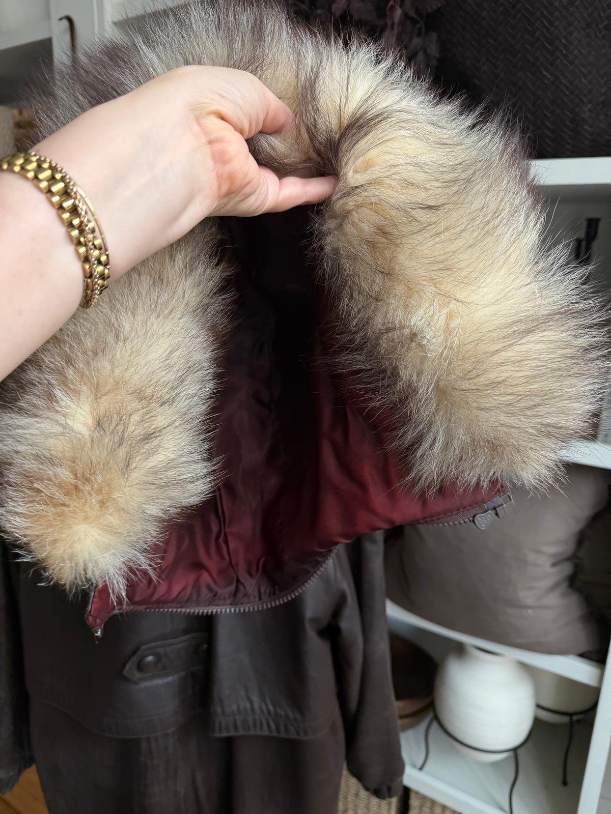 80s Tibor leather trench with zip out insulation and a zip off leather hood with real fur trim. Made in the USA. Fits S-L