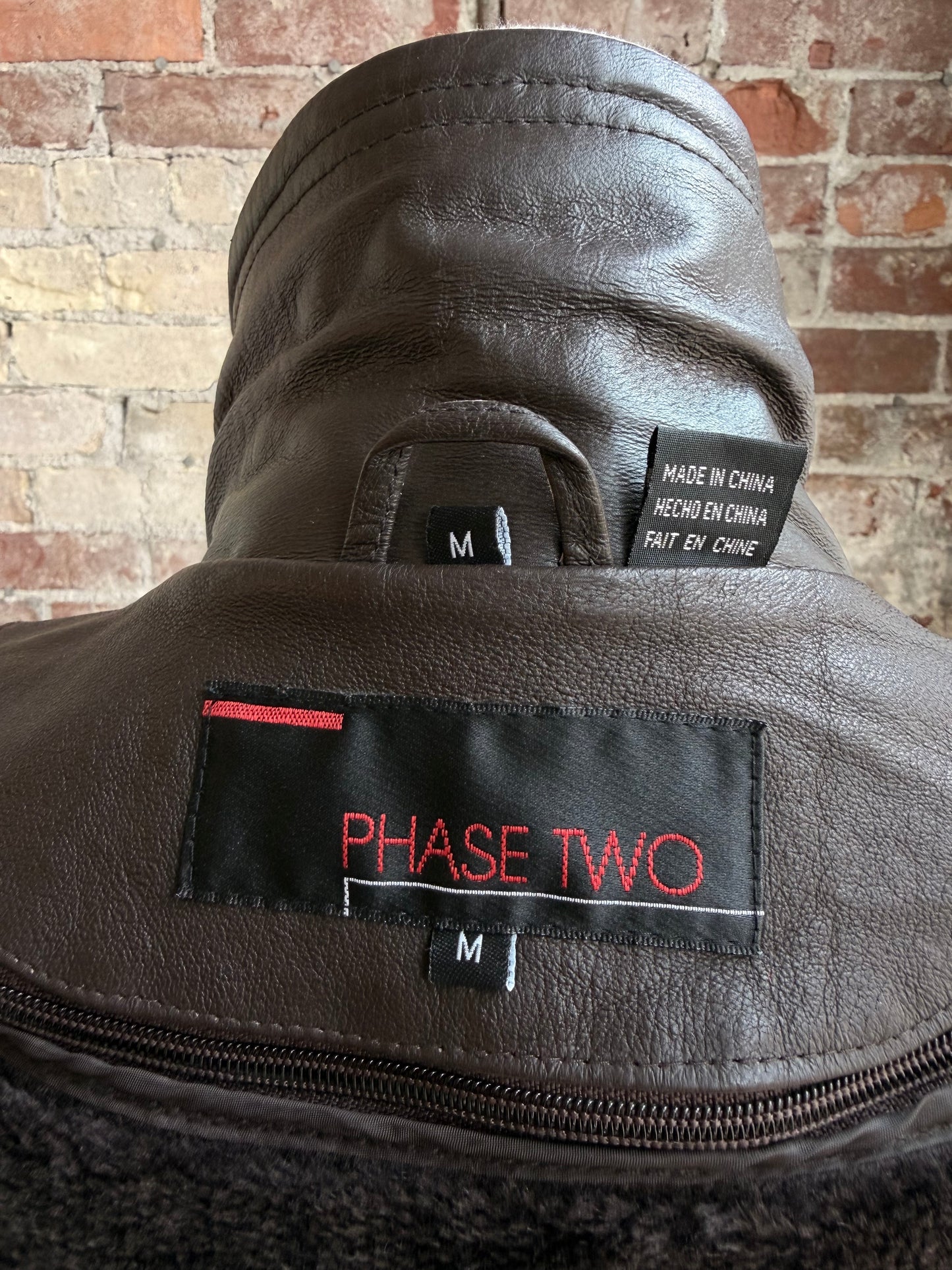 90s Phase Two leather bomber with zip out faux fur lining.