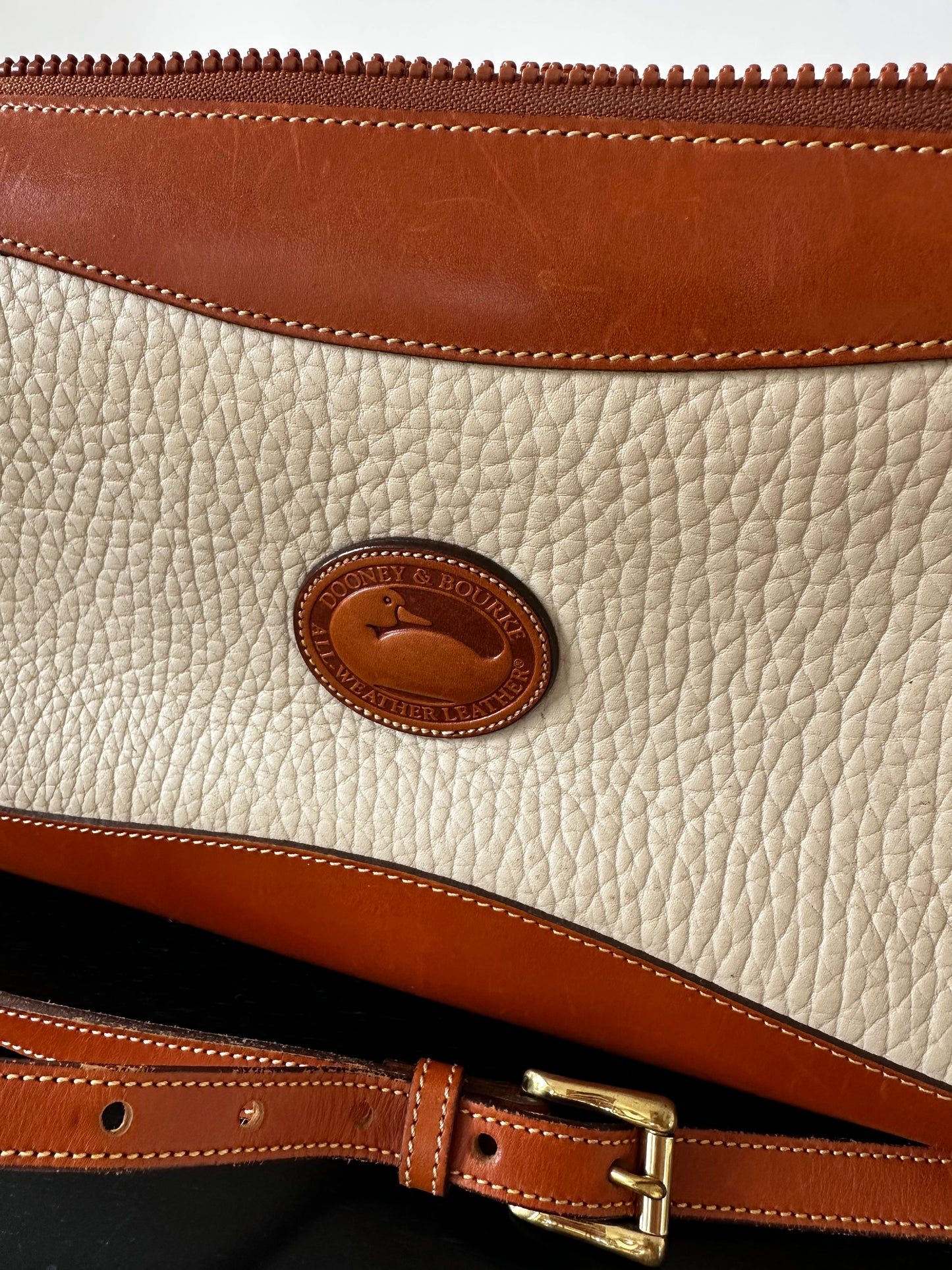 90s Dooney and Bourke zip top crossbody in cream