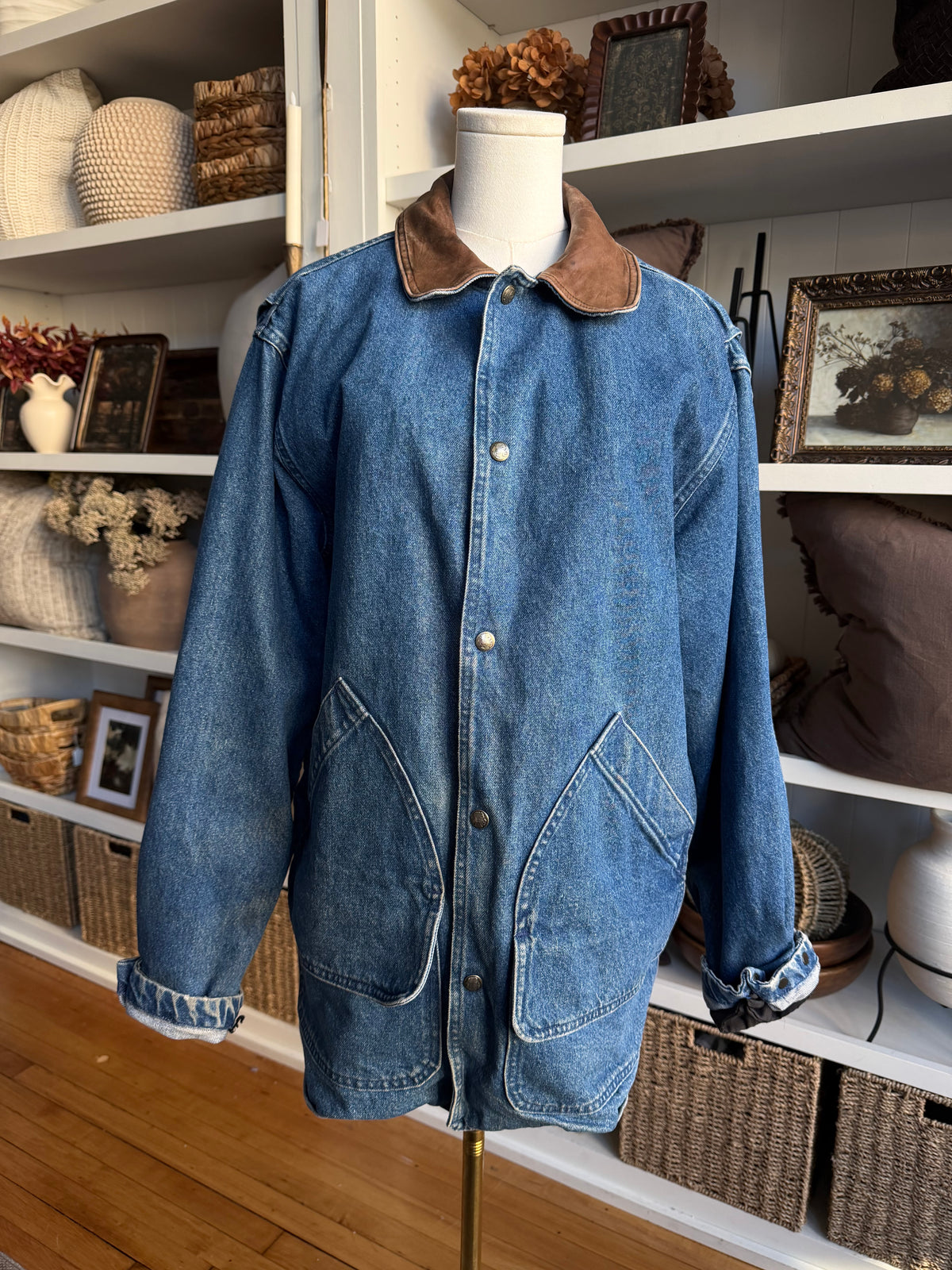 90s Woolrich denim barn coat with button out wool lining and leather collar. Made in the USA