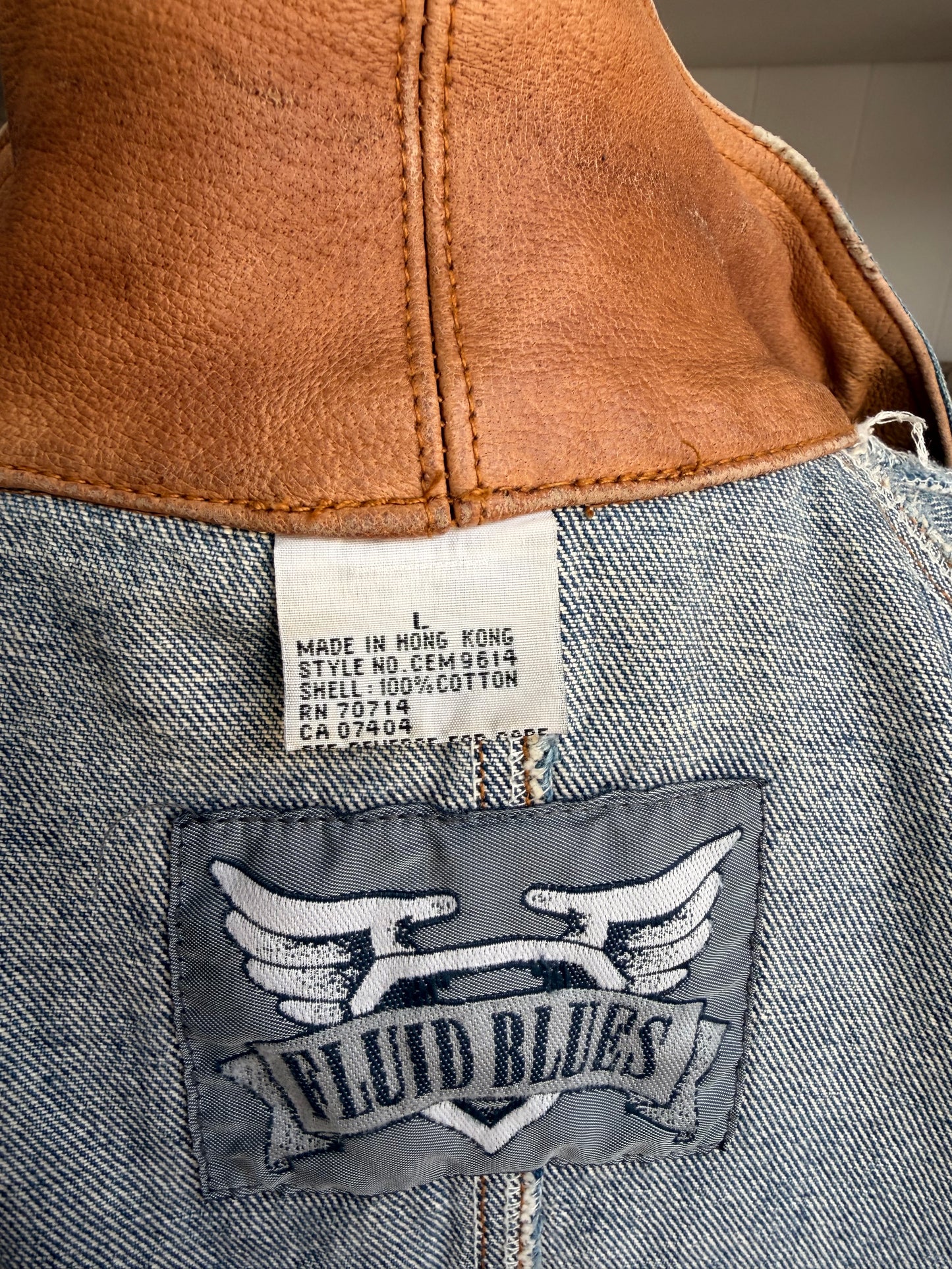 90s Fluid Blues denim trench with leather collar. Made in Hong Kong