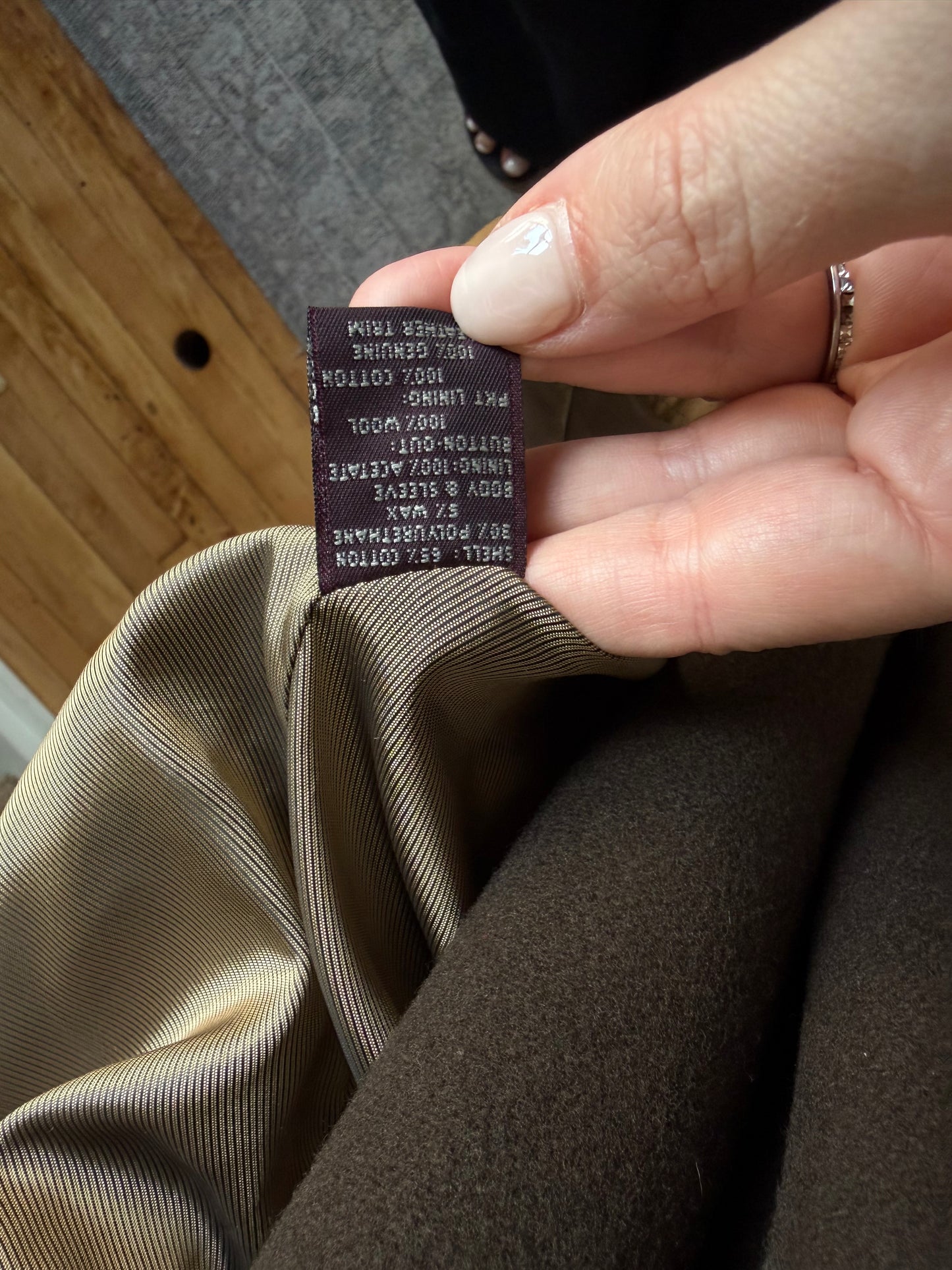90s McKenzie Tribe waxed cotton jacket with leather collar and button out wool liner. Made in the USA. Fits M-XL