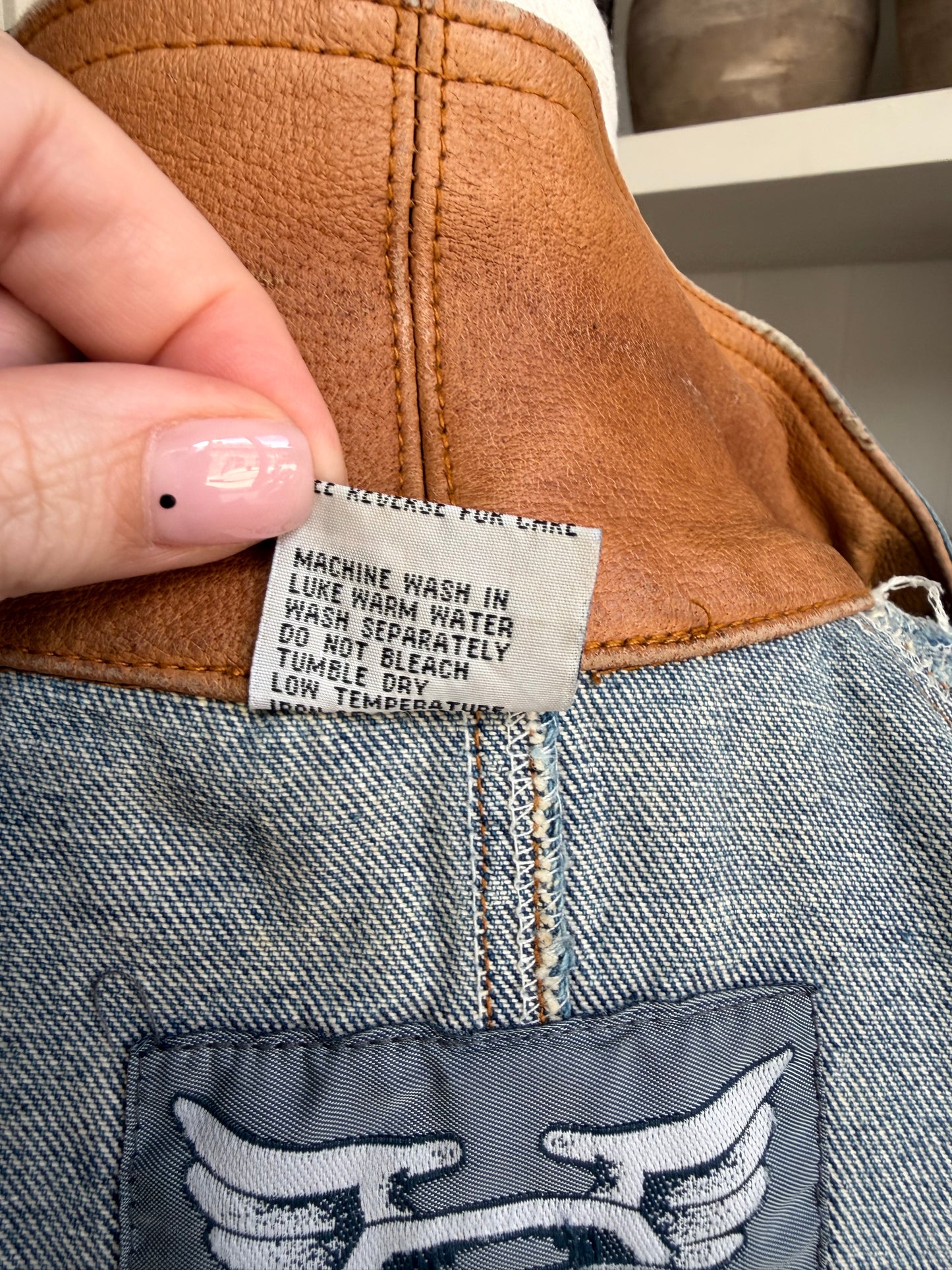 90s Fluid Blues denim trench with leather collar. Made in Hong Kong