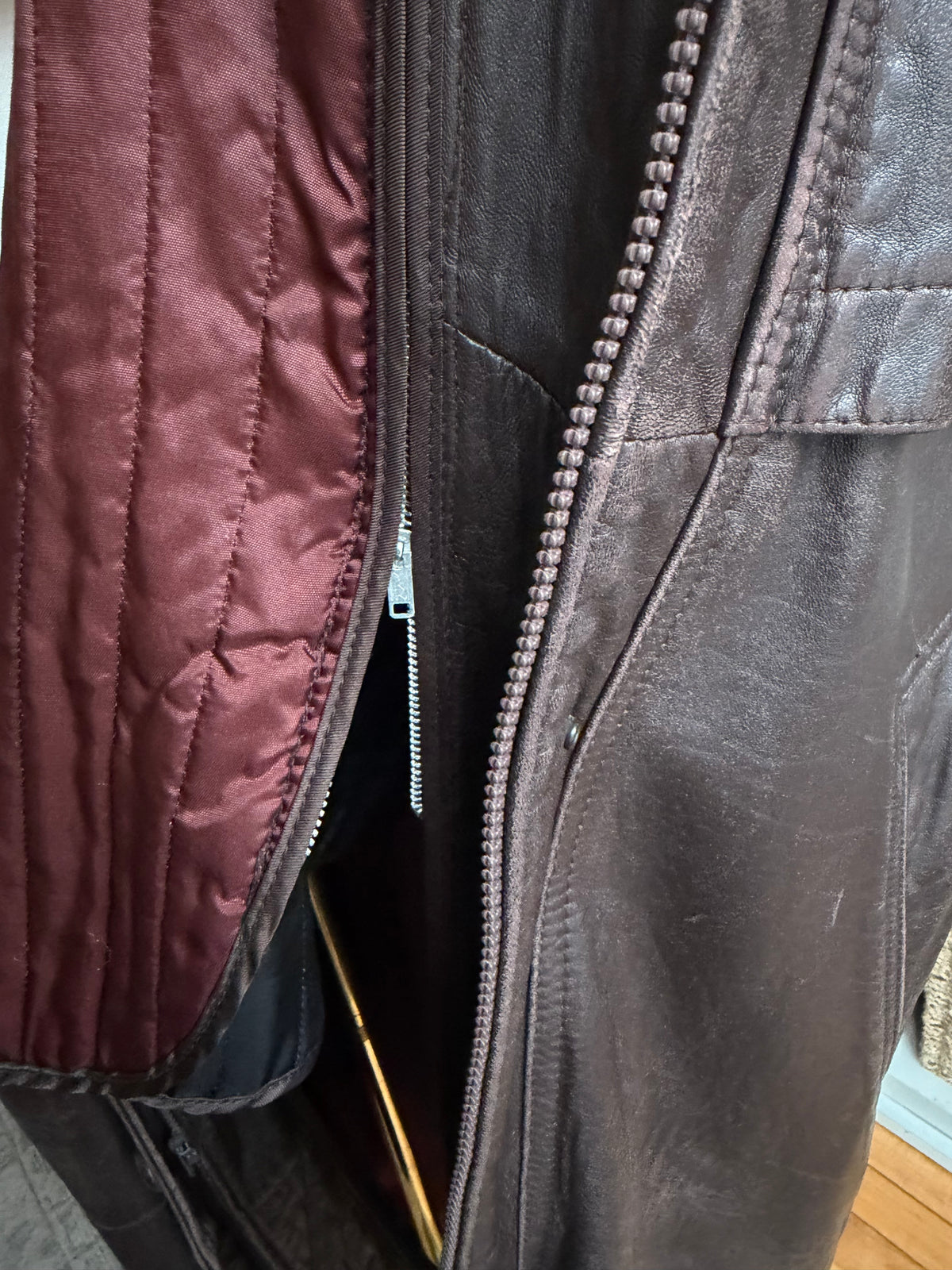 80s Tibor leather trench with zip out insulation and a zip off leather hood with real fur trim. Made in the USA. Fits S-L