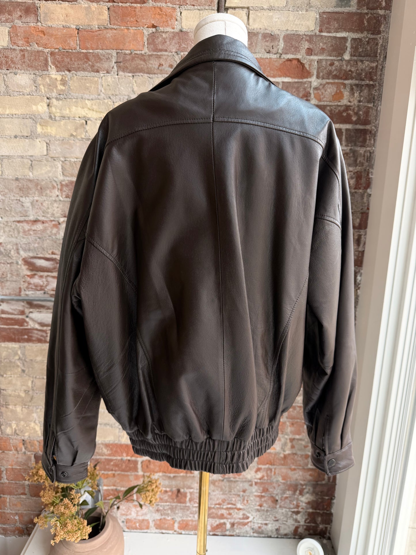90s Phase Two leather bomber with zip out faux fur lining.