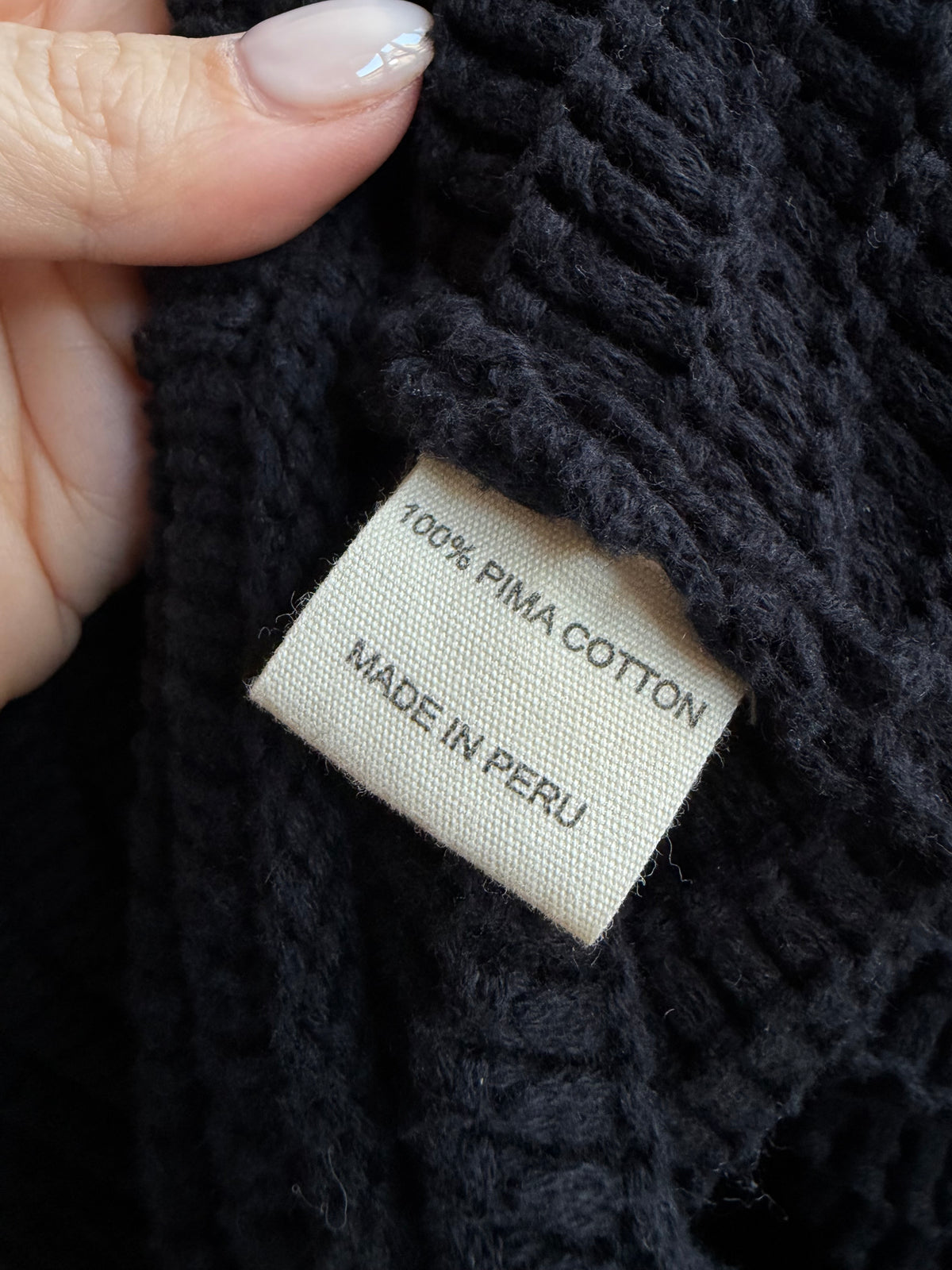 Na Nin Romy Pima cotton balloon sleeve sweater in black.