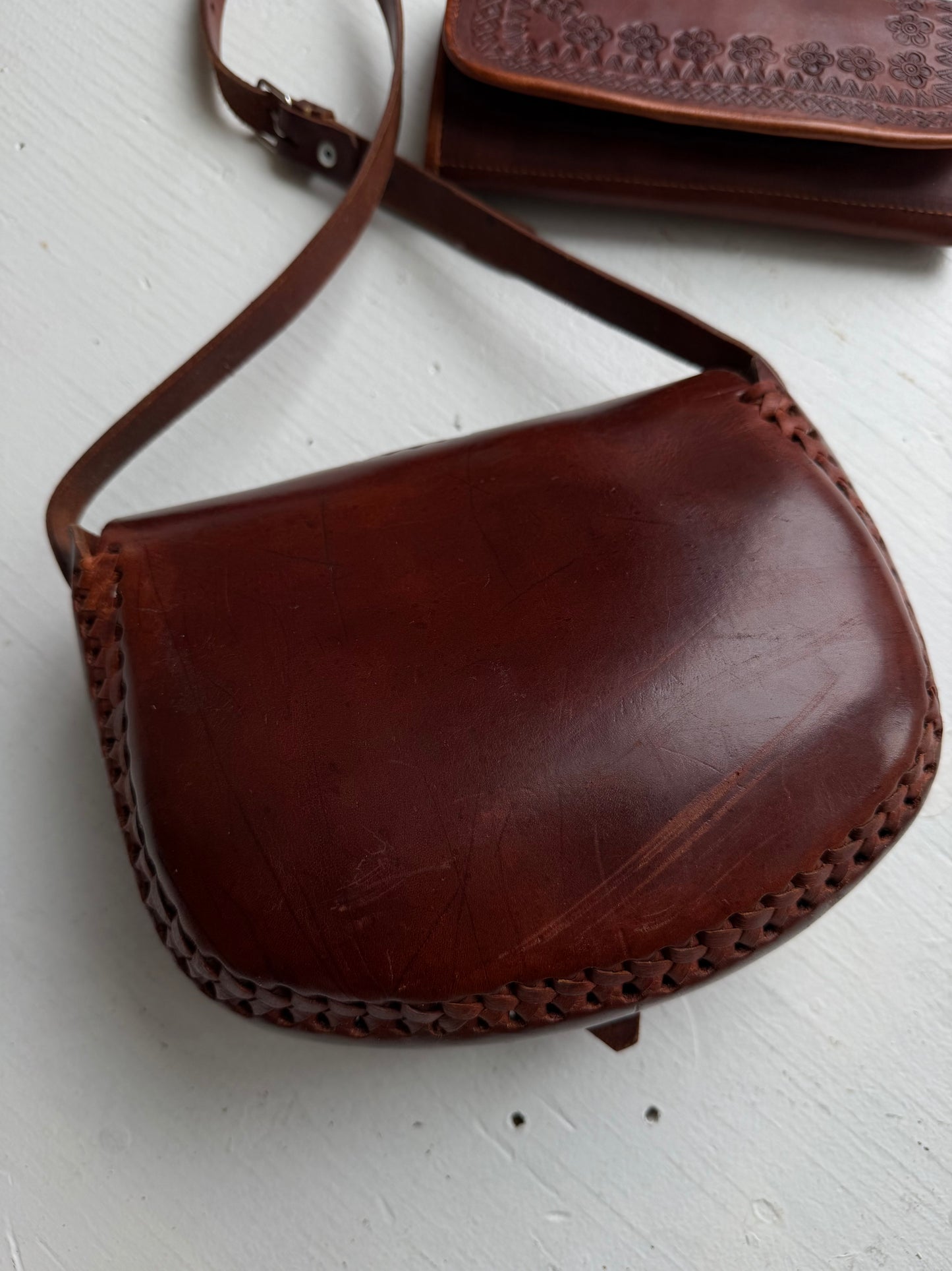 Tooled leather bag with leather wallet. Hand made