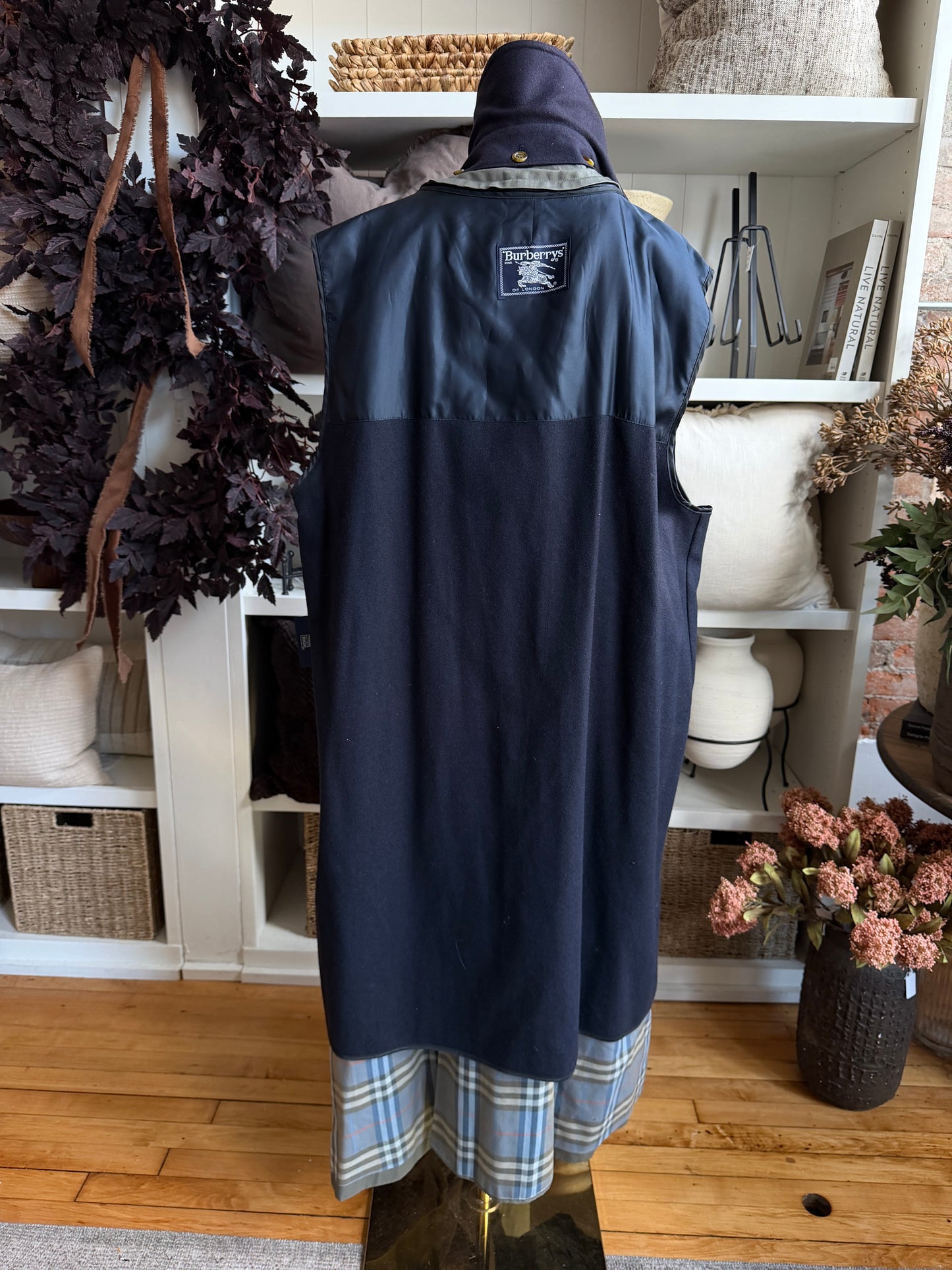 Vintage Burberry green trench with navy wool zip out lining and button off collar. Fits S-L