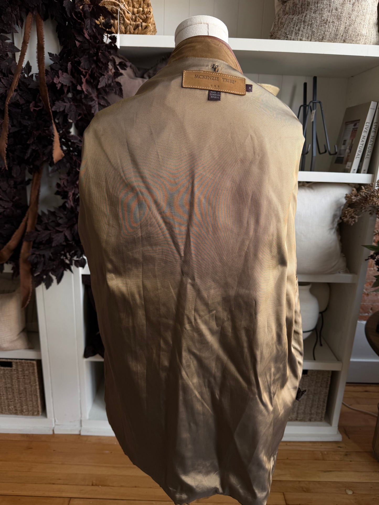 90s McKenzie Tribe waxed cotton jacket with leather collar and button out wool liner. Made in the USA. Fits M-XL