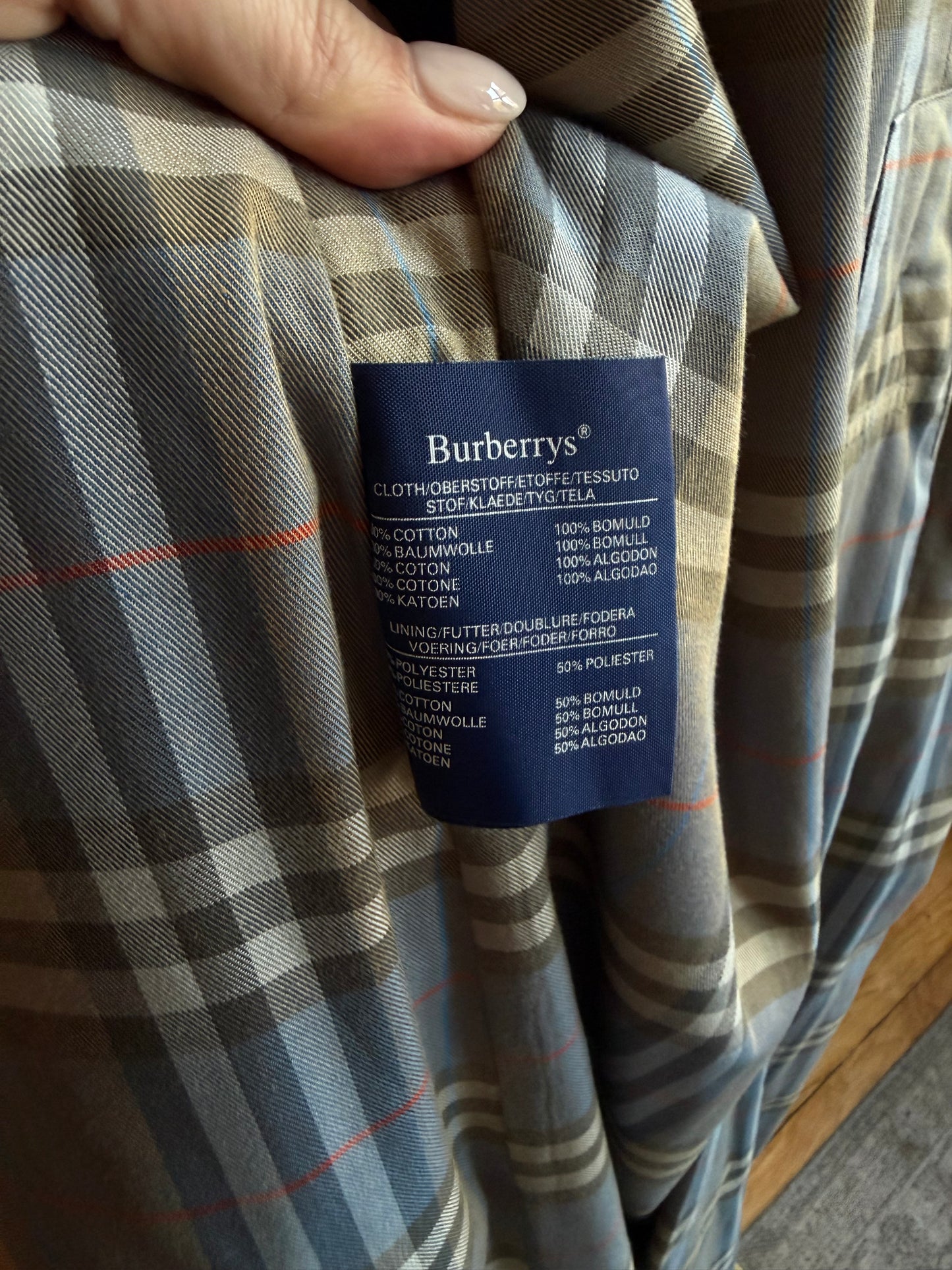 Vintage Burberry green trench with navy wool zip out lining and button off collar. Fits S-L