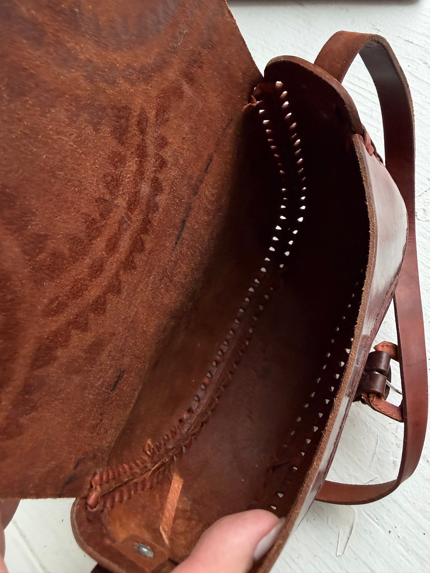 Tooled leather bag with leather wallet. Hand made