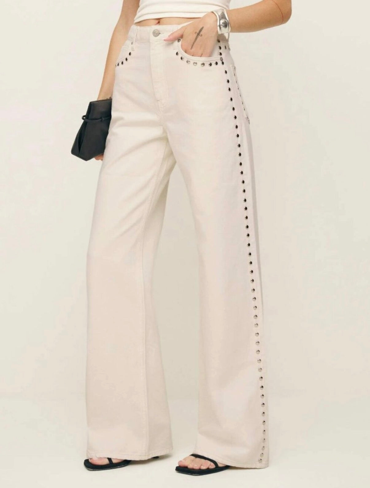Reformation Carly studded jeans in cream. Size 28