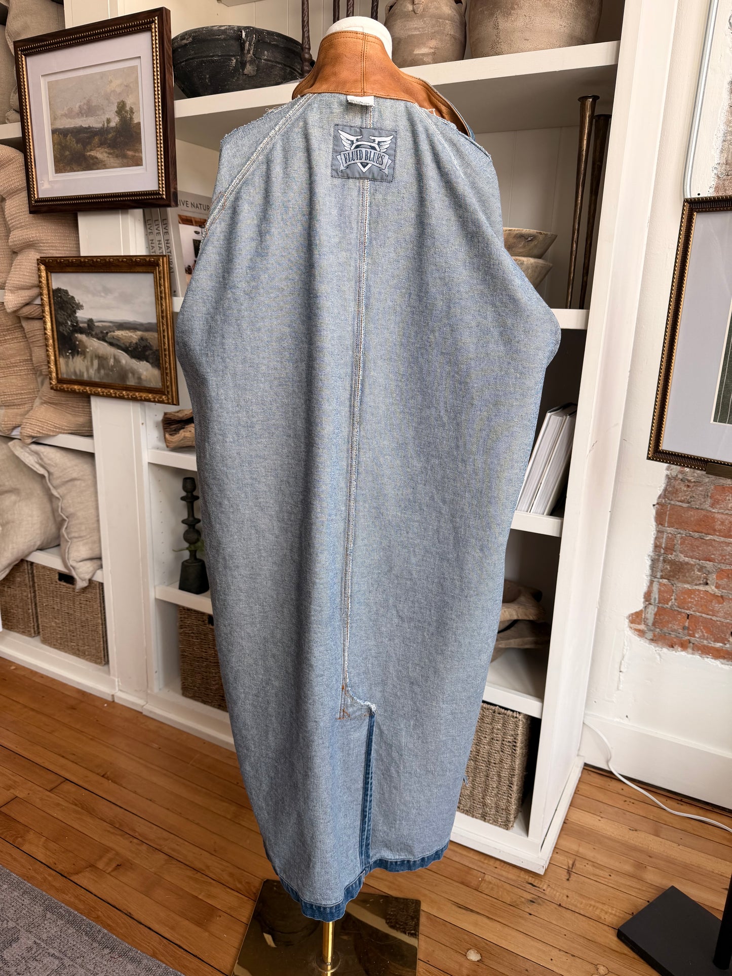 90s Fluid Blues denim trench with leather collar. Made in Hong Kong