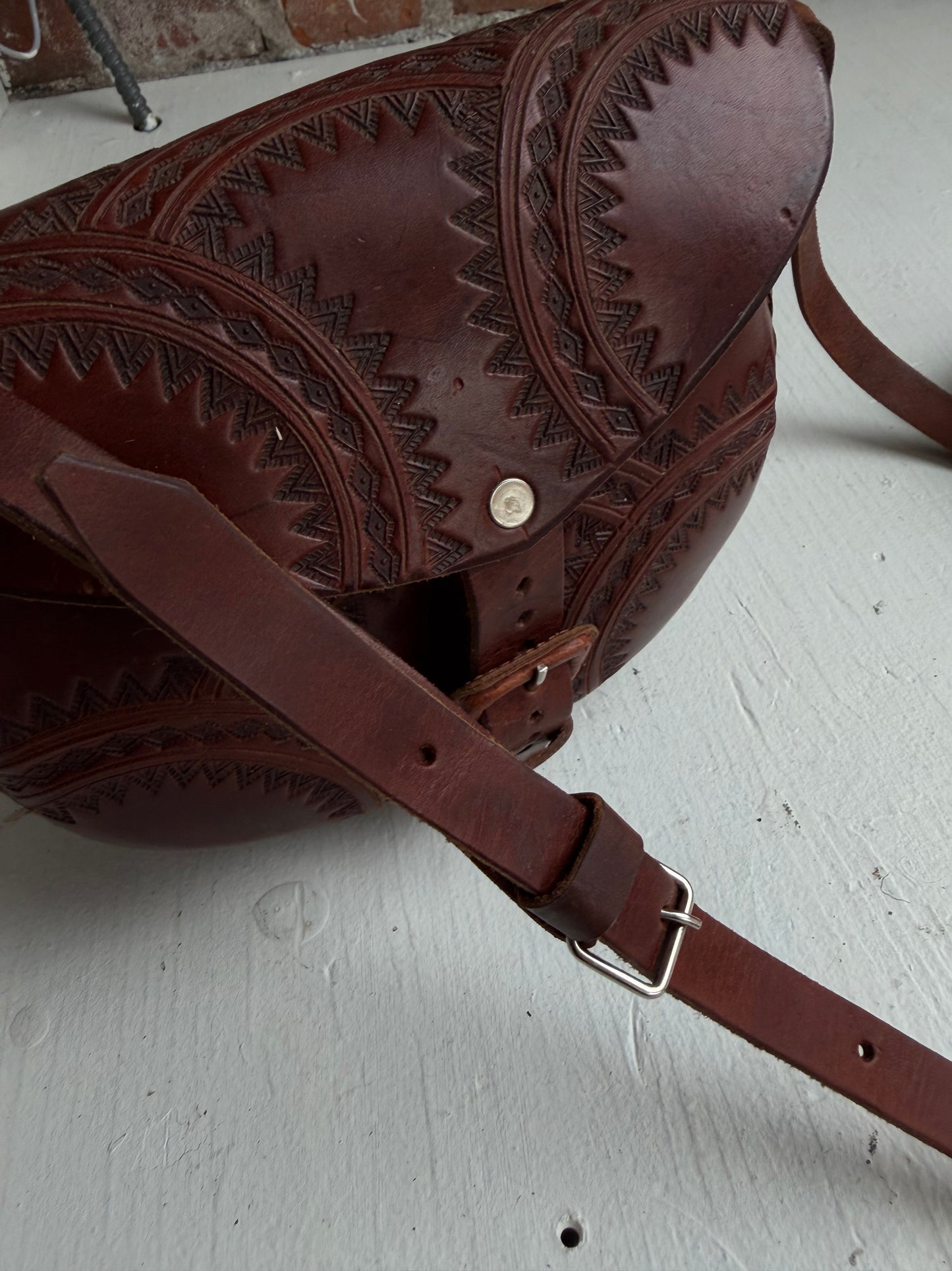 Tooled leather bag with leather wallet. Hand made