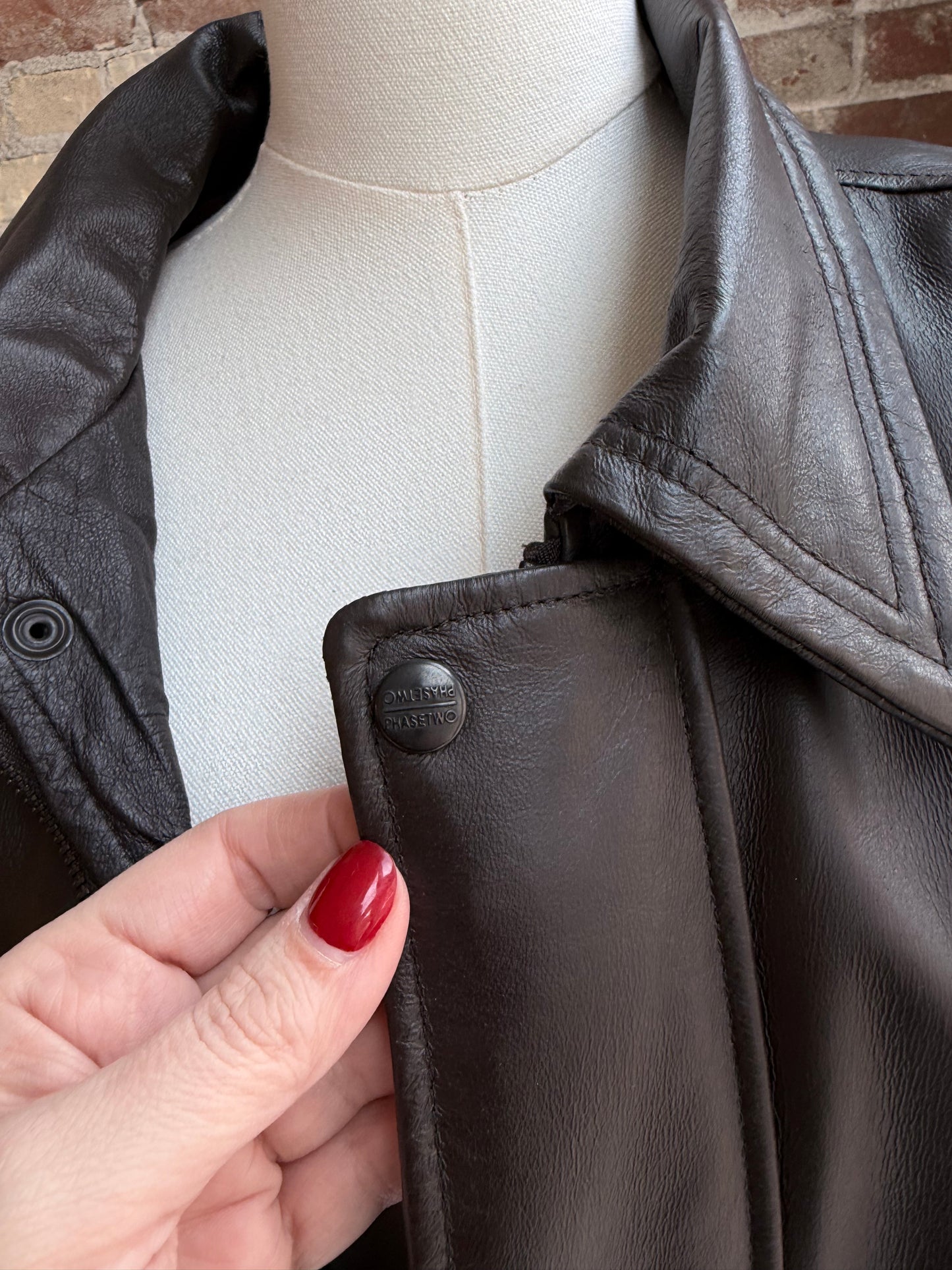 90s Phase Two leather bomber with zip out faux fur lining.