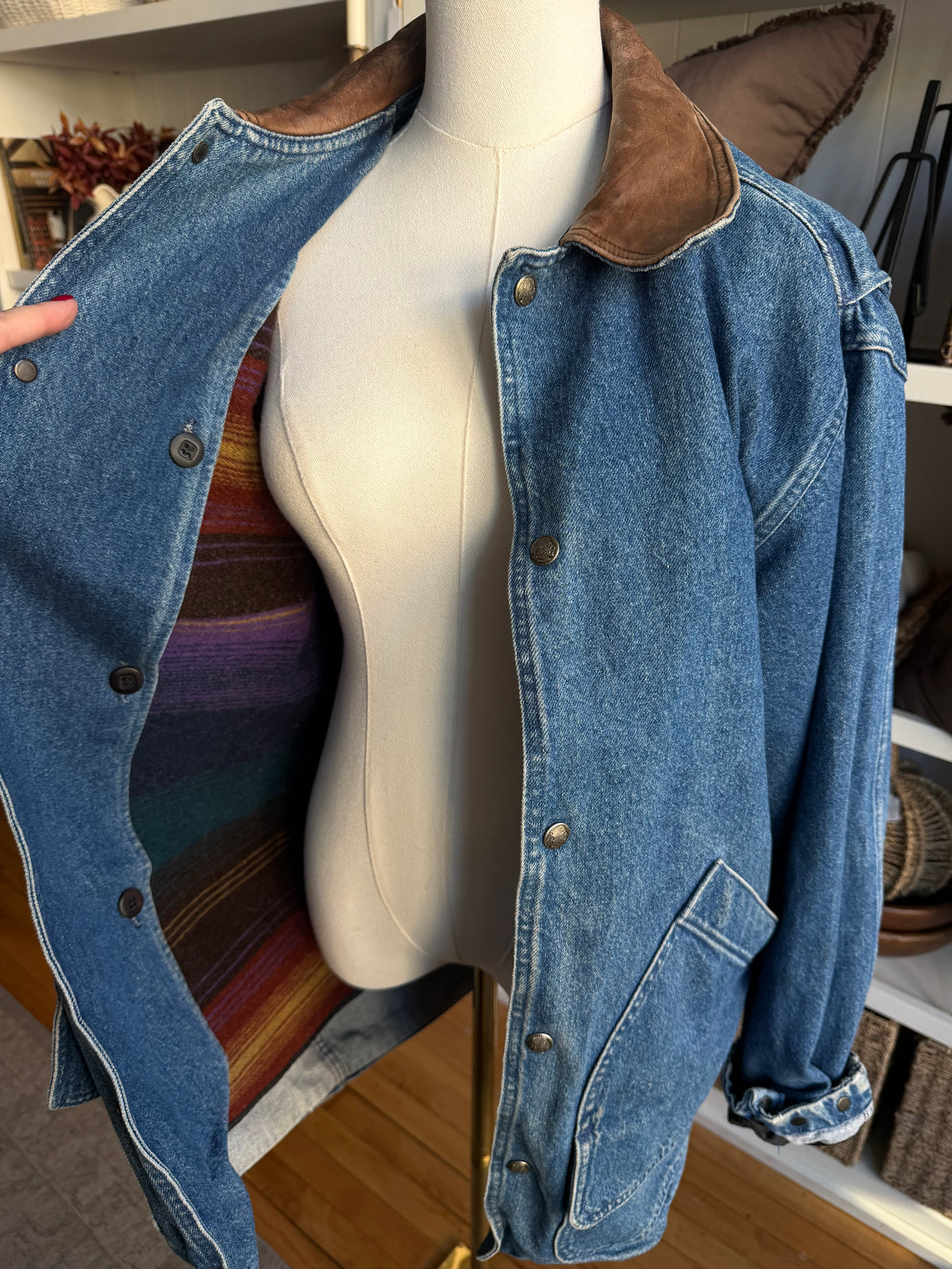 90s Woolrich denim barn coat with button out wool lining and leather collar. Made in the USA