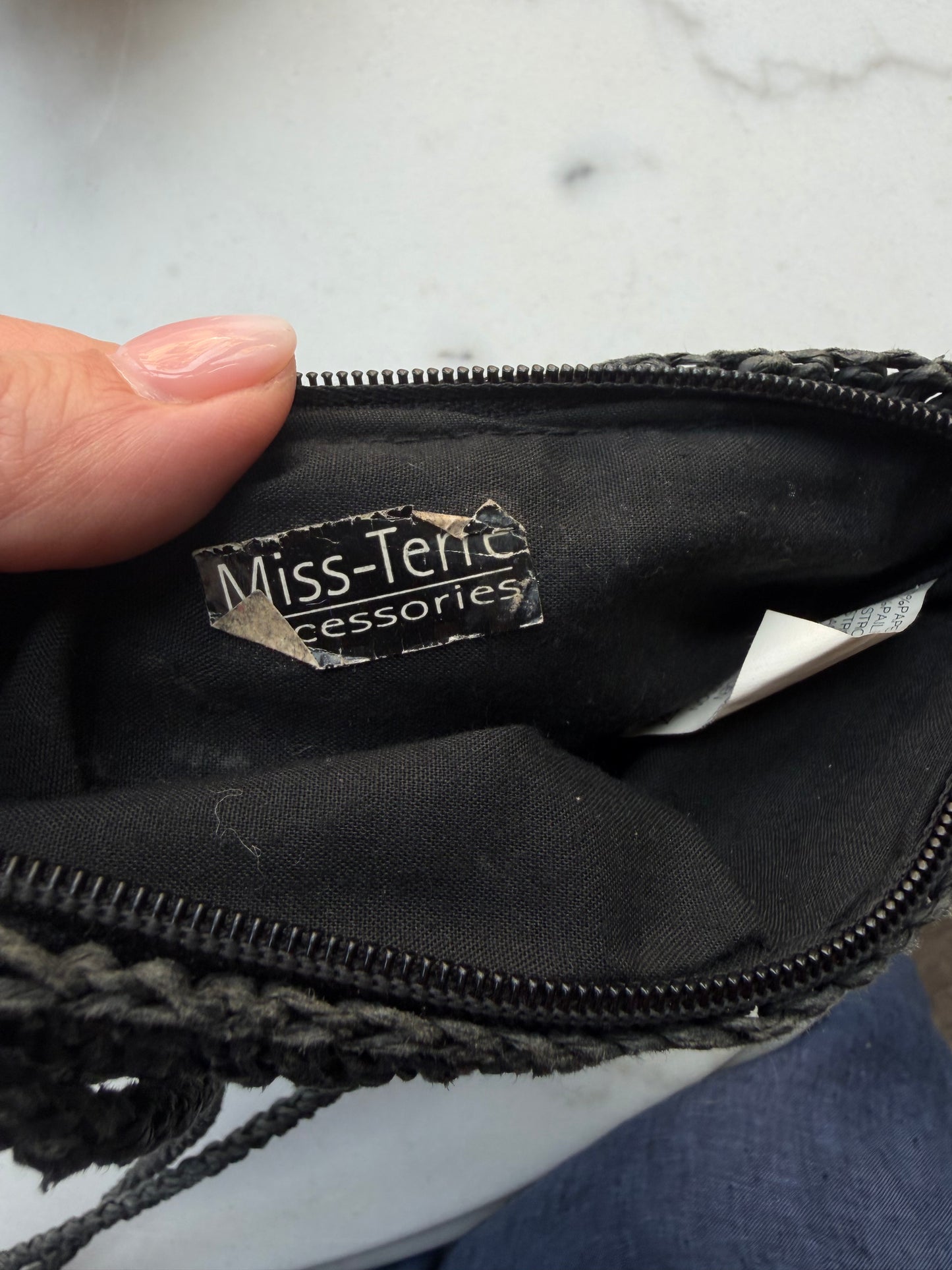 Vintage black woven paper crossbody bag. Sourced in Paris