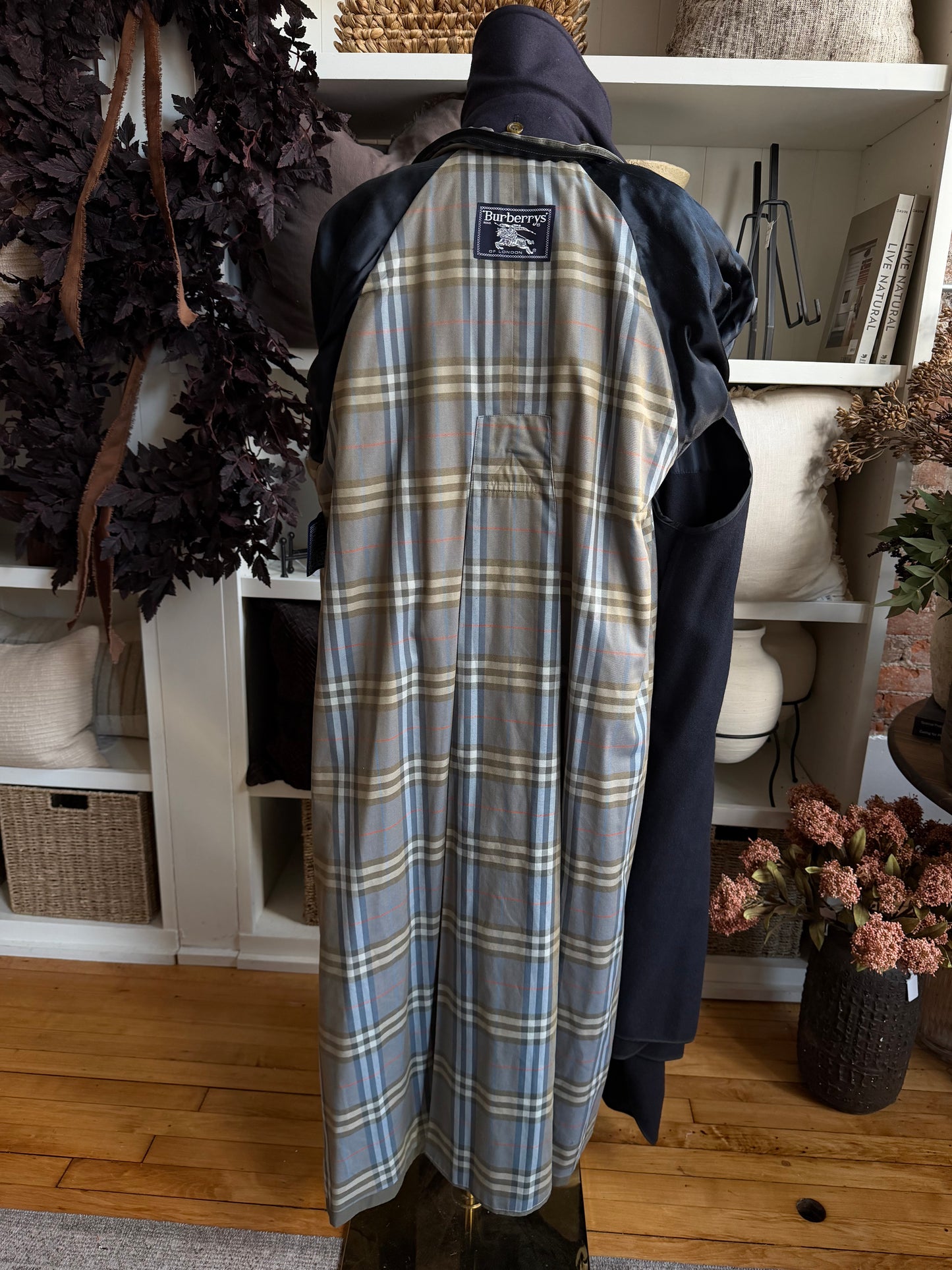 Vintage Burberry green trench with navy wool zip out lining and button off collar. Fits S-L
