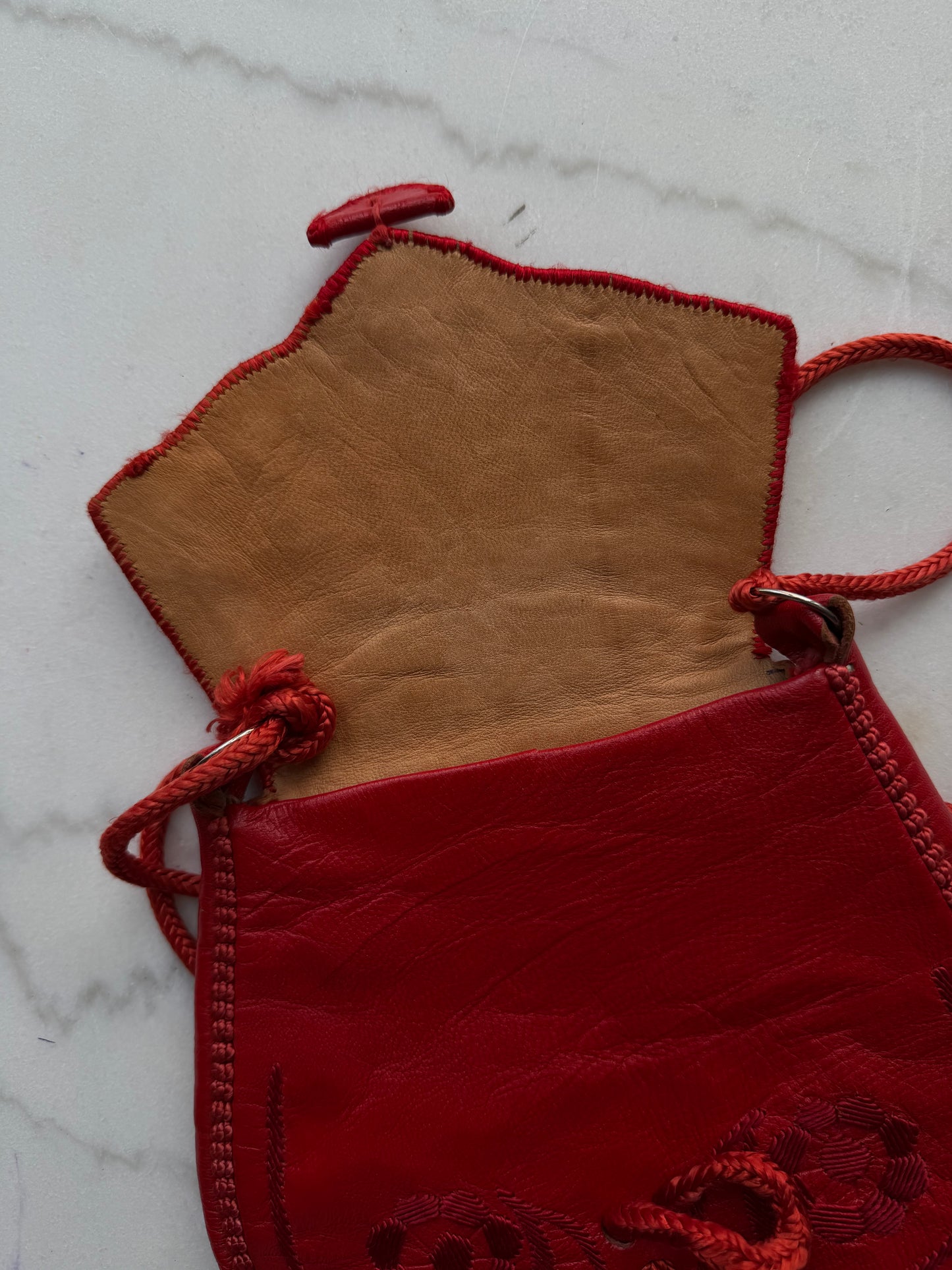 Vintage red leather embroidered crossbody. Sourced in Paris