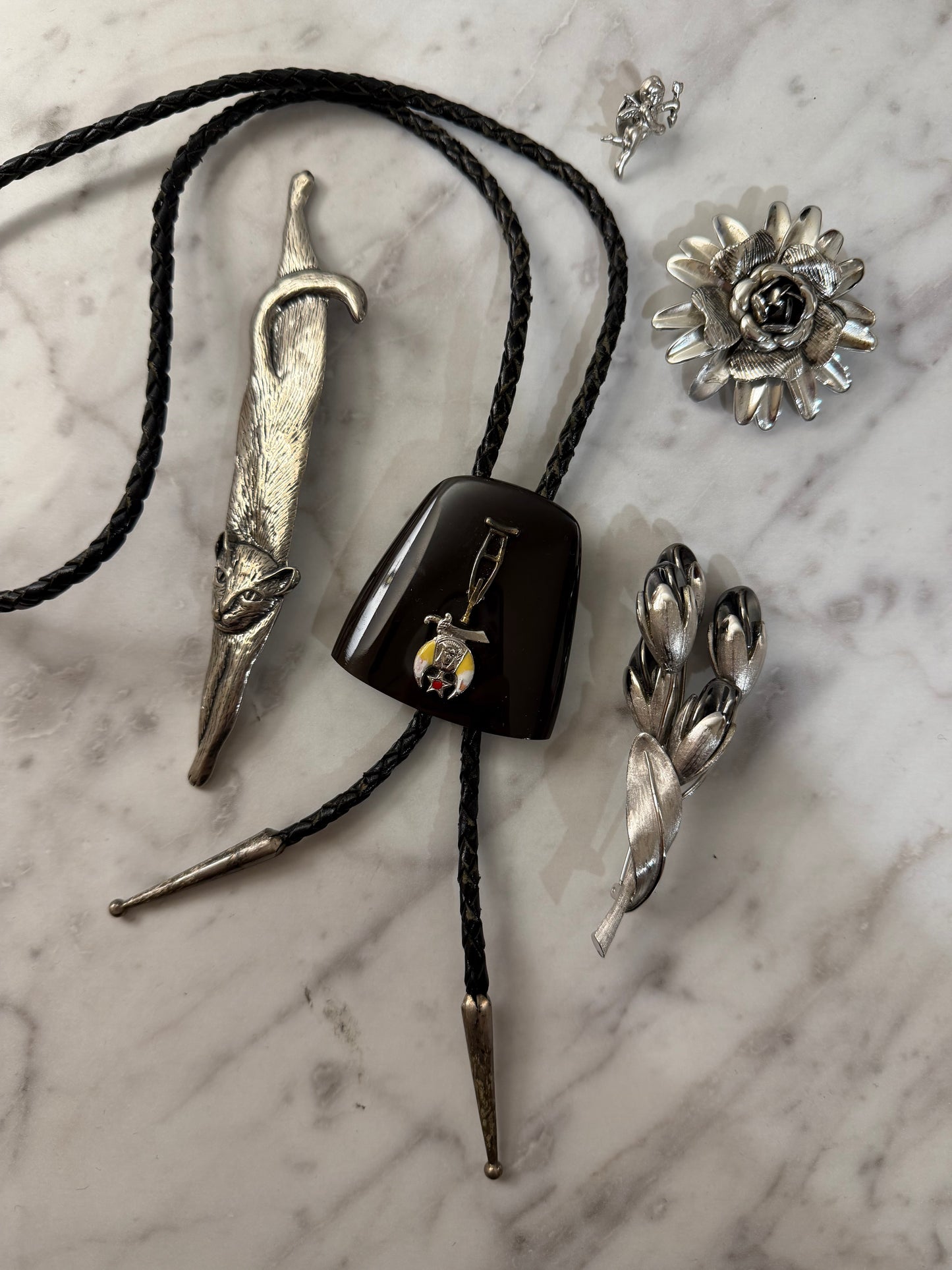 Bolo and silver brooch pack