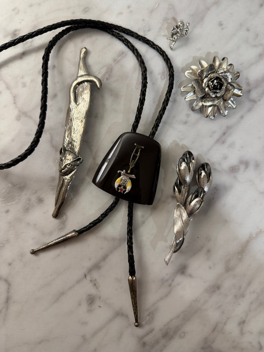 Bolo and silver brooch pack